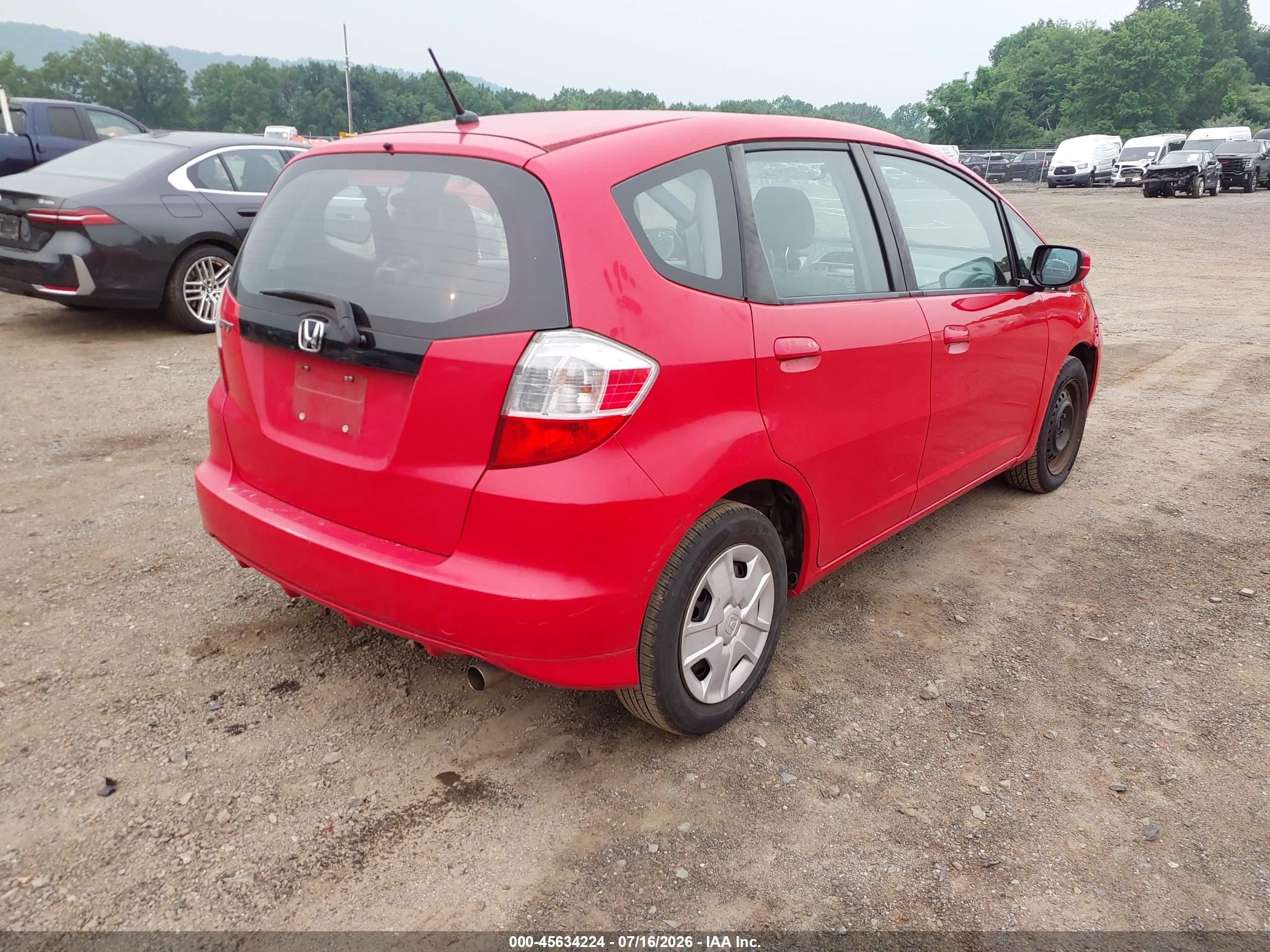 2012 Honda Fit   Red vin: JHMGE8G35CC035939