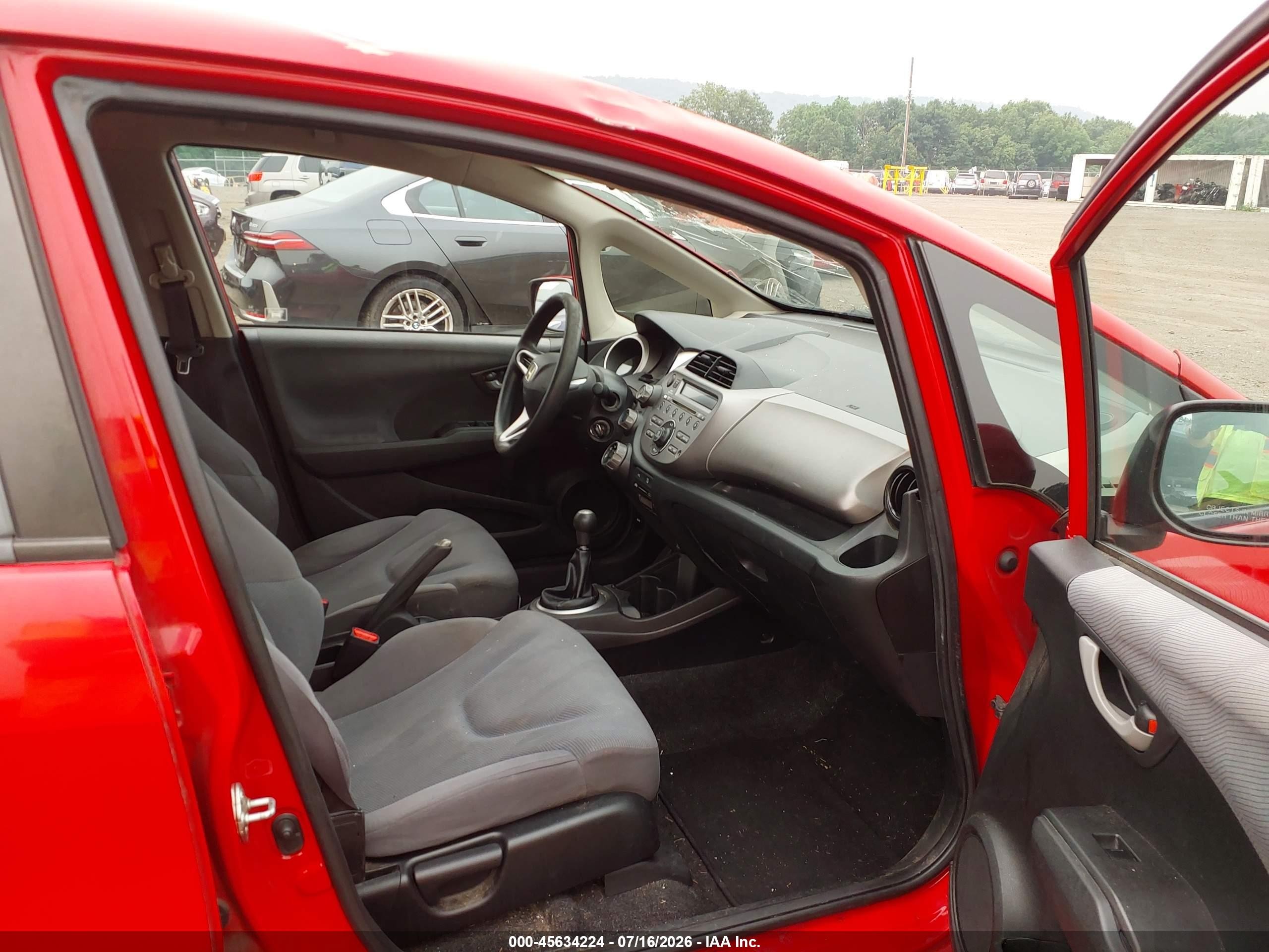 2012 Honda Fit   Red vin: JHMGE8G35CC035939