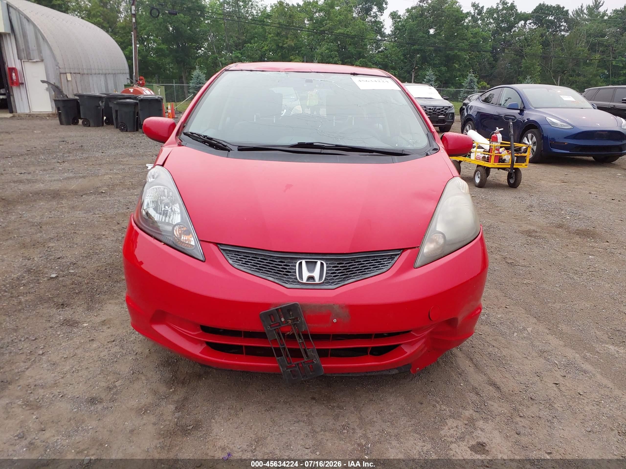 2012 Honda Fit   Red vin: JHMGE8G35CC035939
