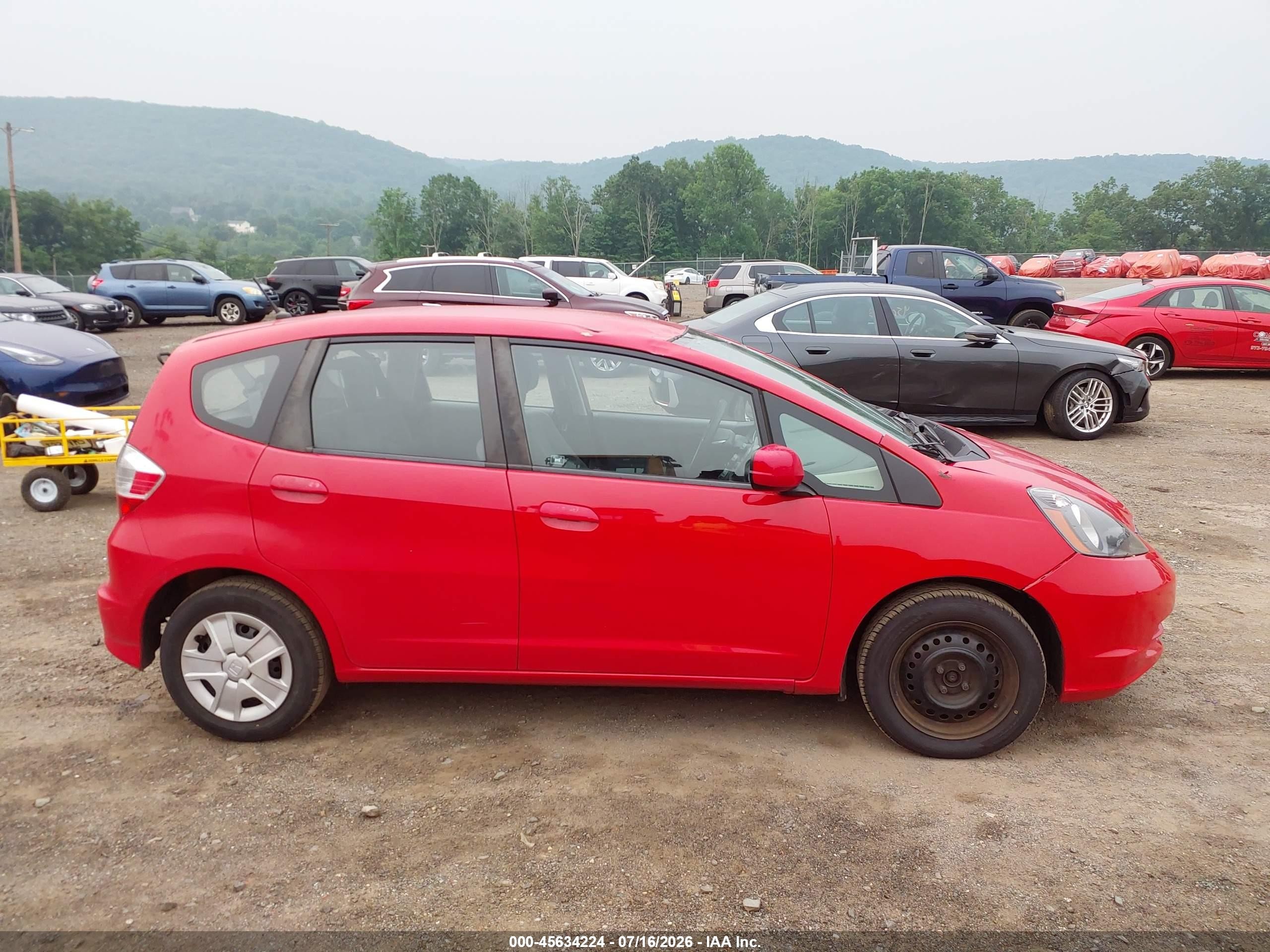 2012 Honda Fit   Red vin: JHMGE8G35CC035939