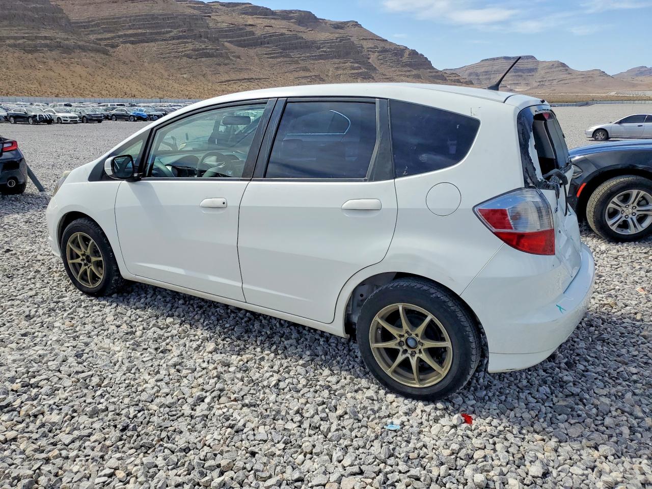2012 Honda Fit White vin: JHMGE8G38CC027477