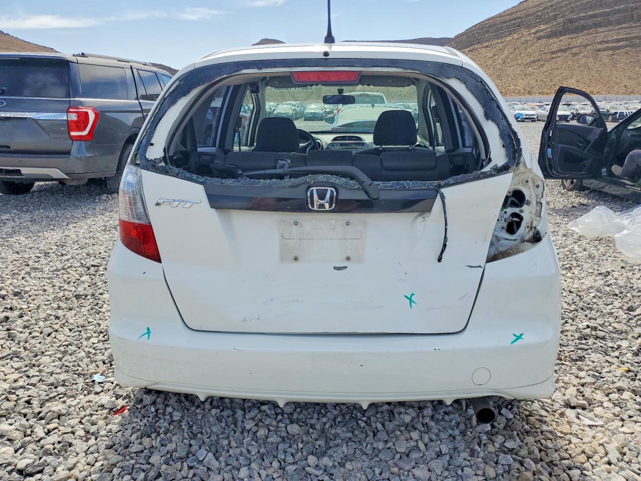 2012 Honda Fit White vin: JHMGE8G38CC027477