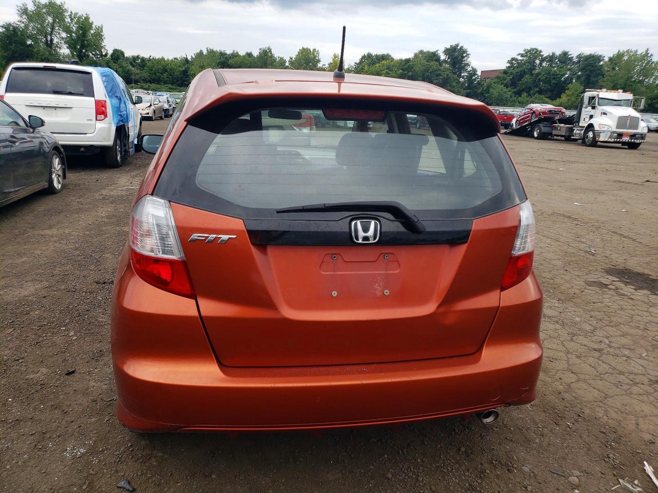 2012 Honda Fit Sport Orange vin: JHMGE8G55CC009102