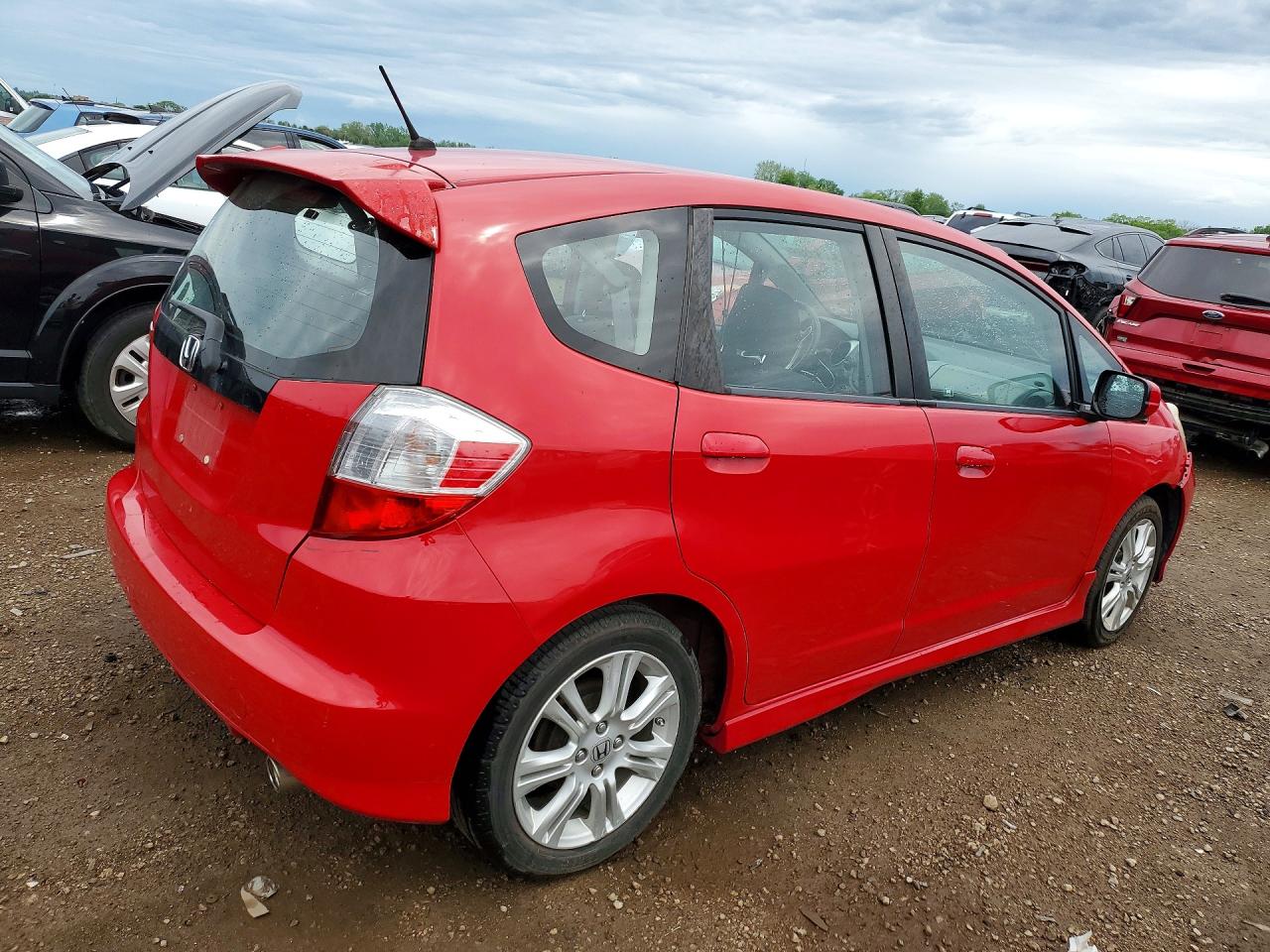2011 Honda Fit Sport Red vin: JHMGE8G56BS001384