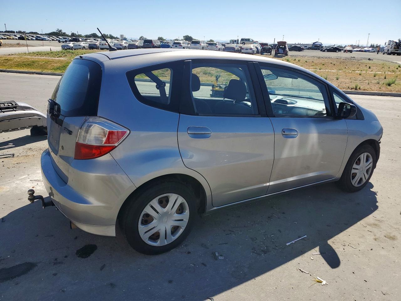 2010 Honda Fit Silver vin: JHMGE8H24AC006421