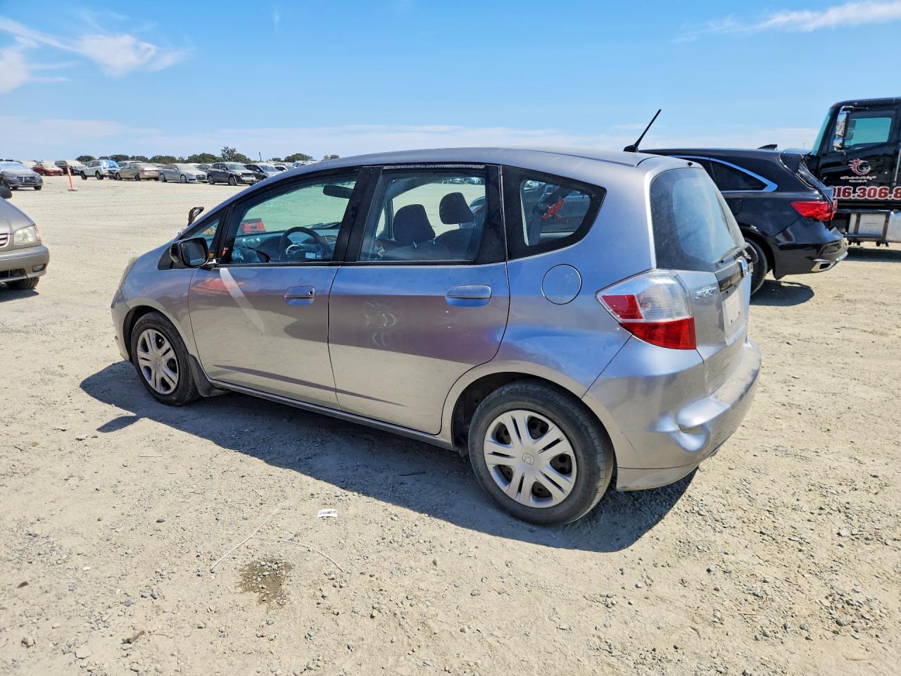 2010 Honda Fit Silver vin: JHMGE8H24AC006676