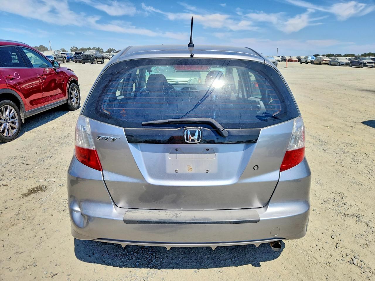 2010 Honda Fit Silver vin: JHMGE8H24AC006676