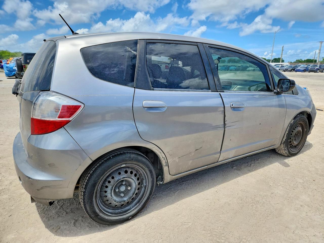 2010 Honda Fit Silver vin: JHMGE8H24AC014258