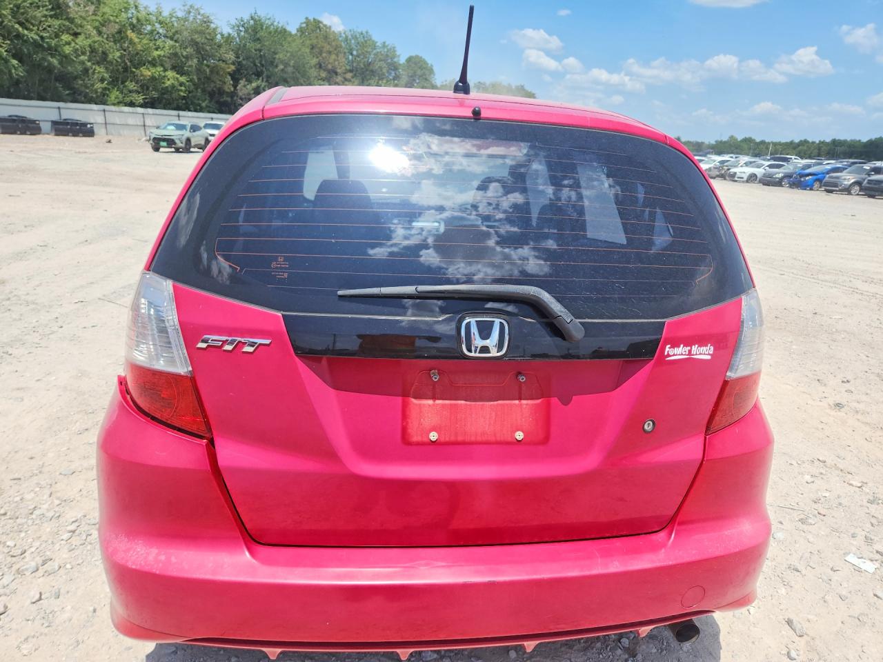 2010 Honda Fit Red vin: JHMGE8H25AC006685