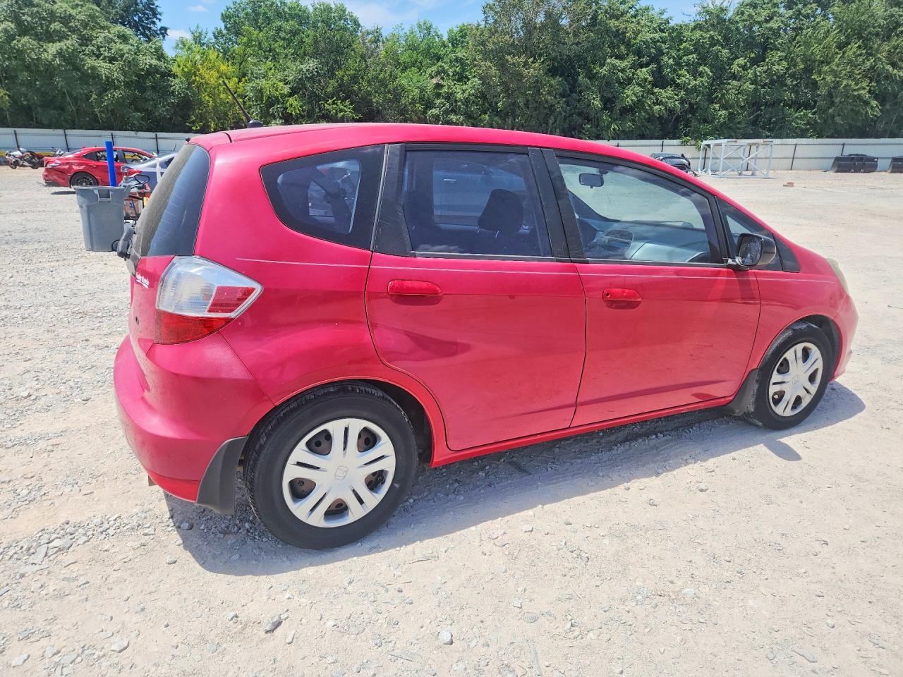 2010 Honda Fit Red vin: JHMGE8H25AC006685