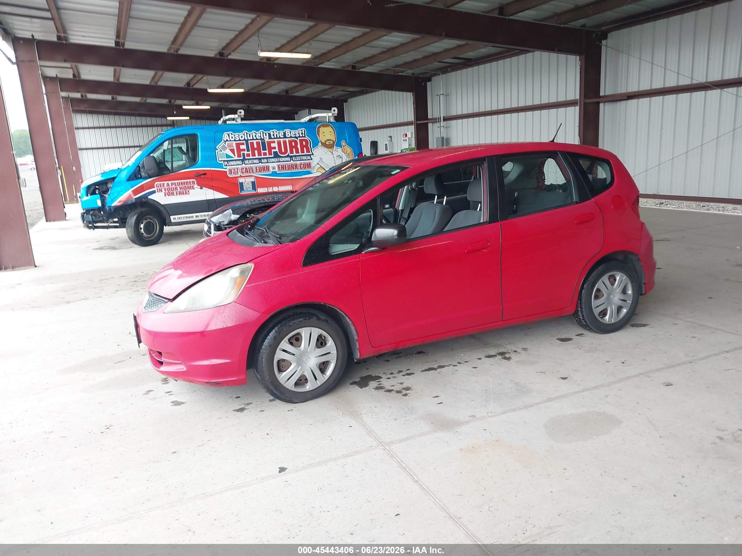 2010 Honda Fit   Red vin: JHMGE8H25AC016780