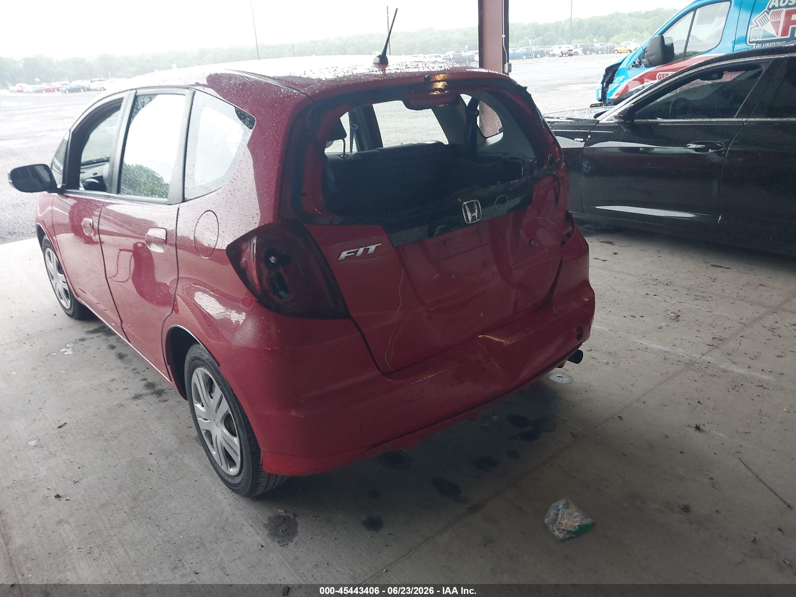 2010 Honda Fit   Red vin: JHMGE8H25AC016780