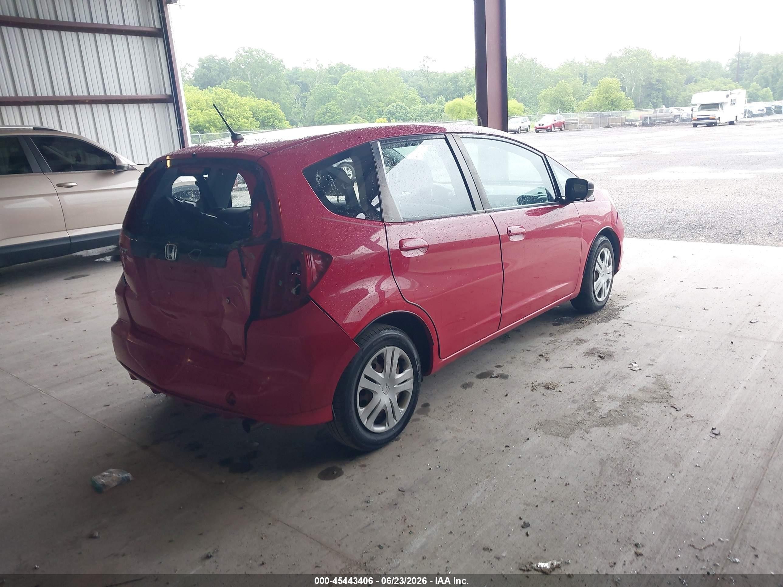 2010 Honda Fit   Red vin: JHMGE8H25AC016780