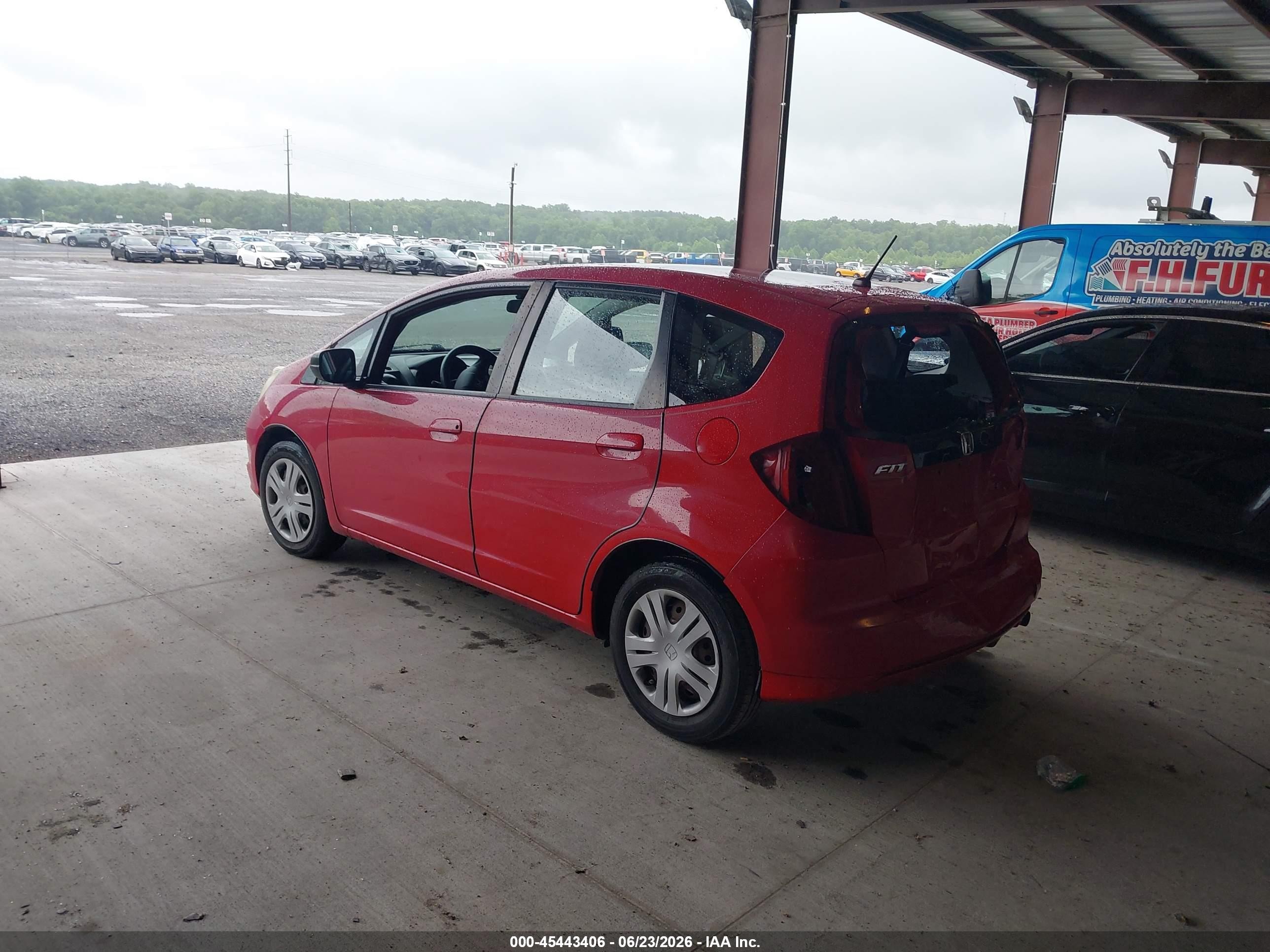 2010 Honda Fit   Red vin: JHMGE8H25AC016780