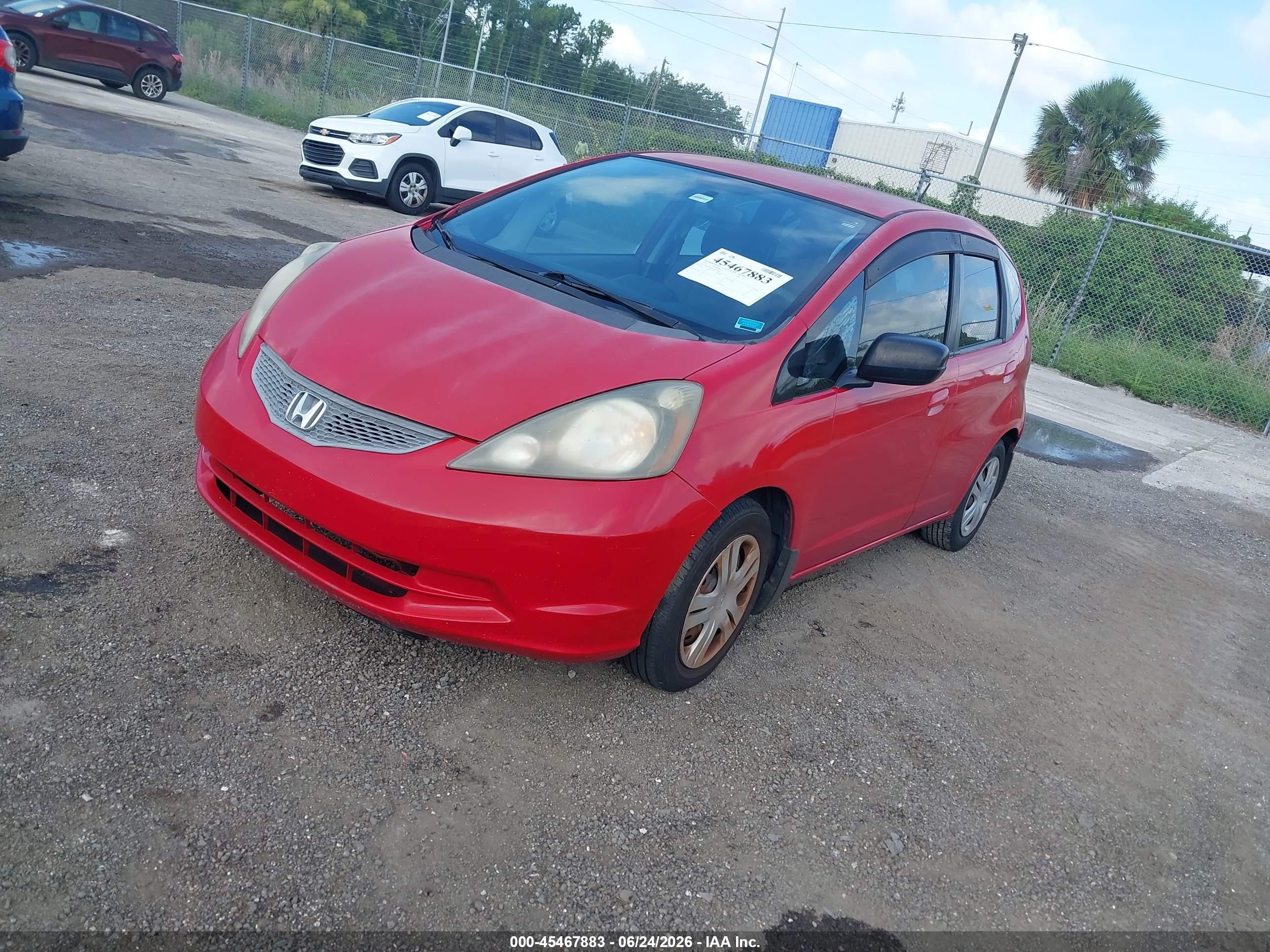 2010 Honda Fit   Red vin: JHMGE8H26AC007196