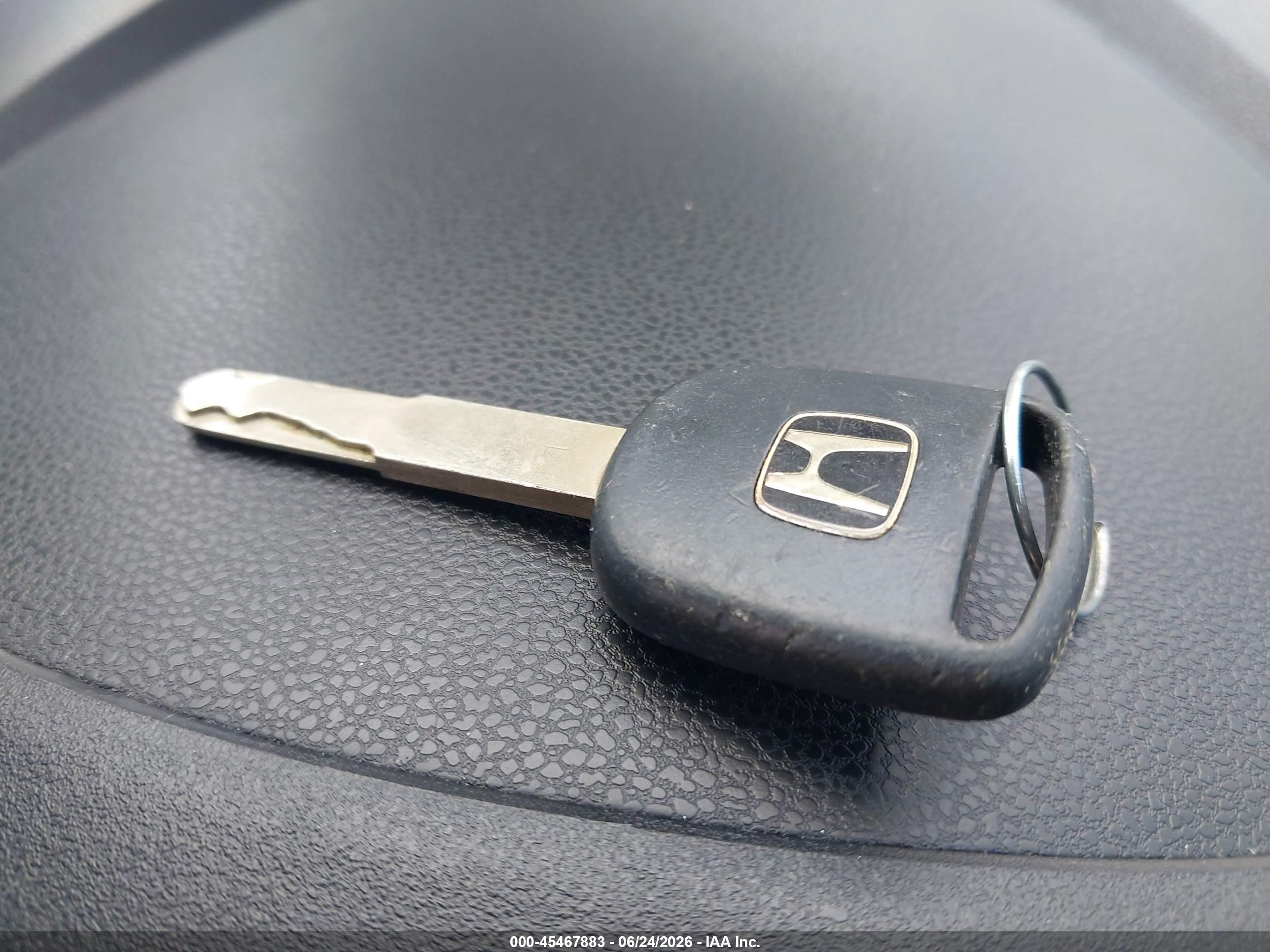 2010 Honda Fit   Red vin: JHMGE8H26AC007196