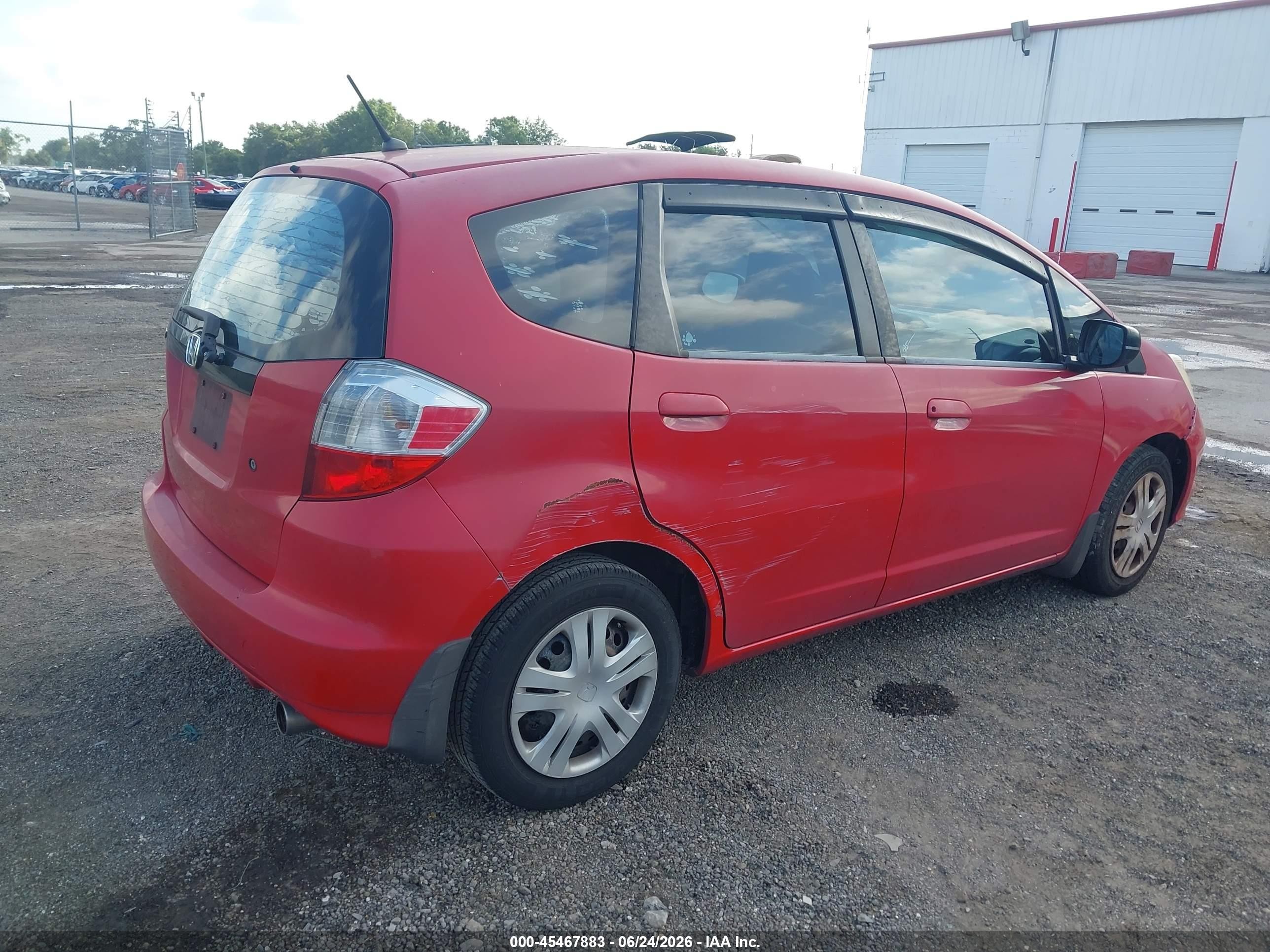 2010 Honda Fit   Red vin: JHMGE8H26AC007196