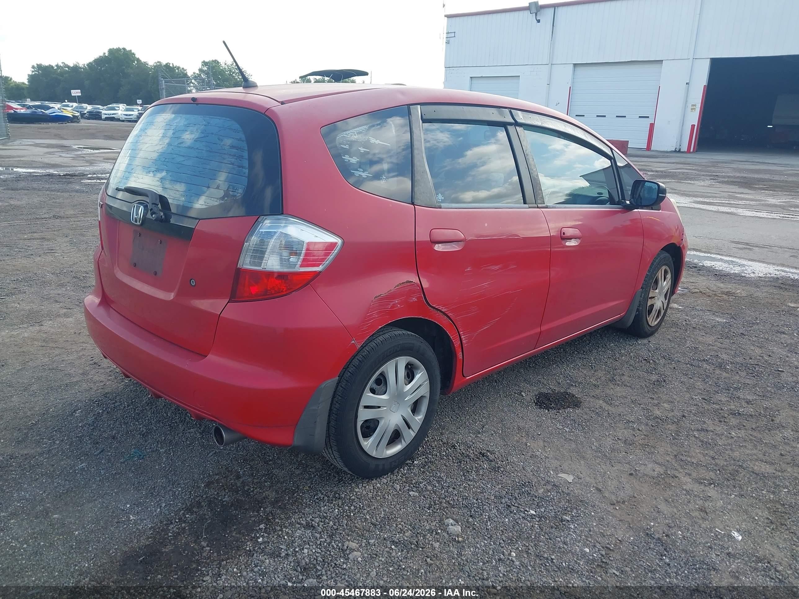2010 Honda Fit   Red vin: JHMGE8H26AC007196