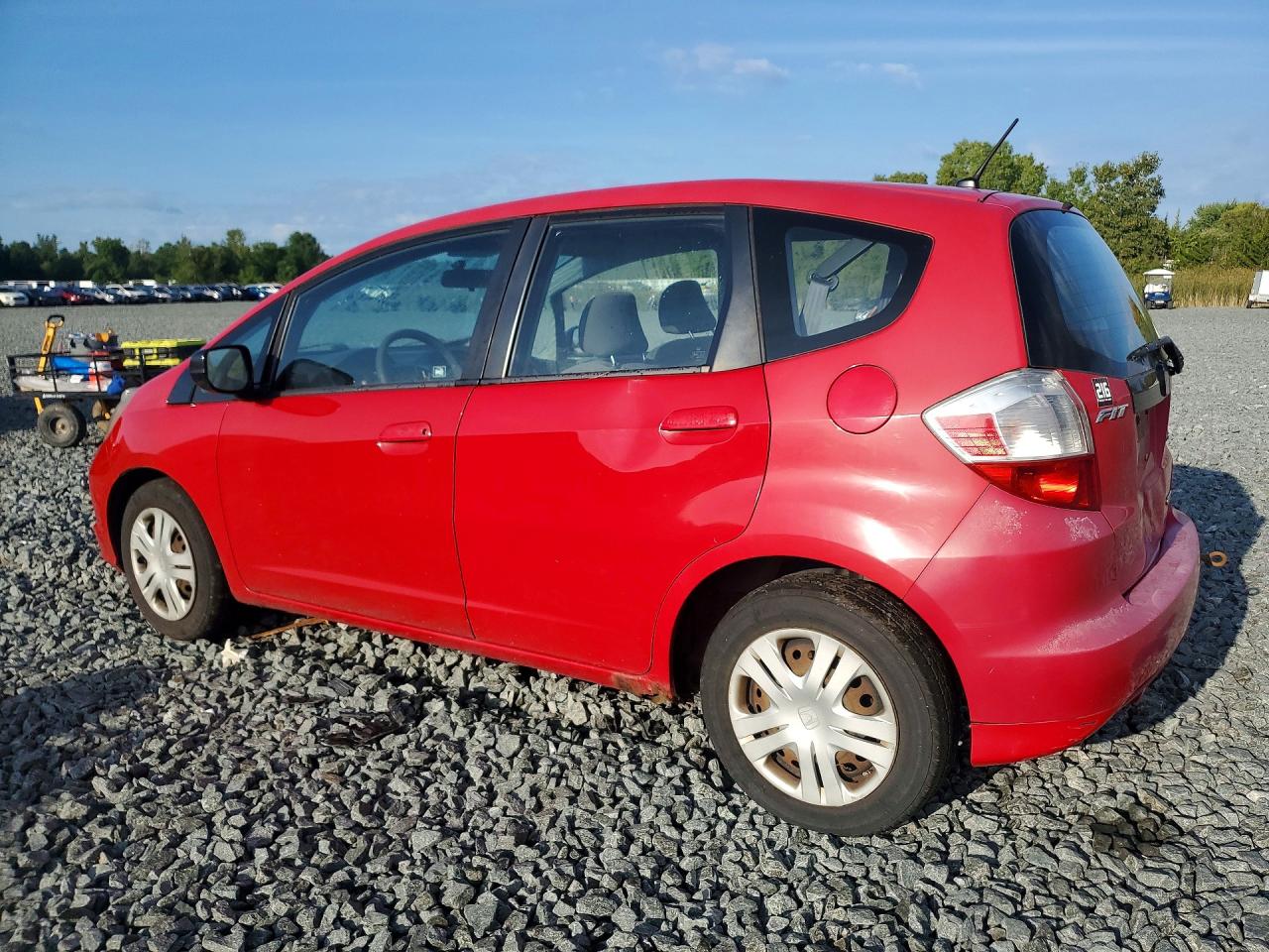 2010 Honda Fit Red vin: JHMGE8H26AC015475