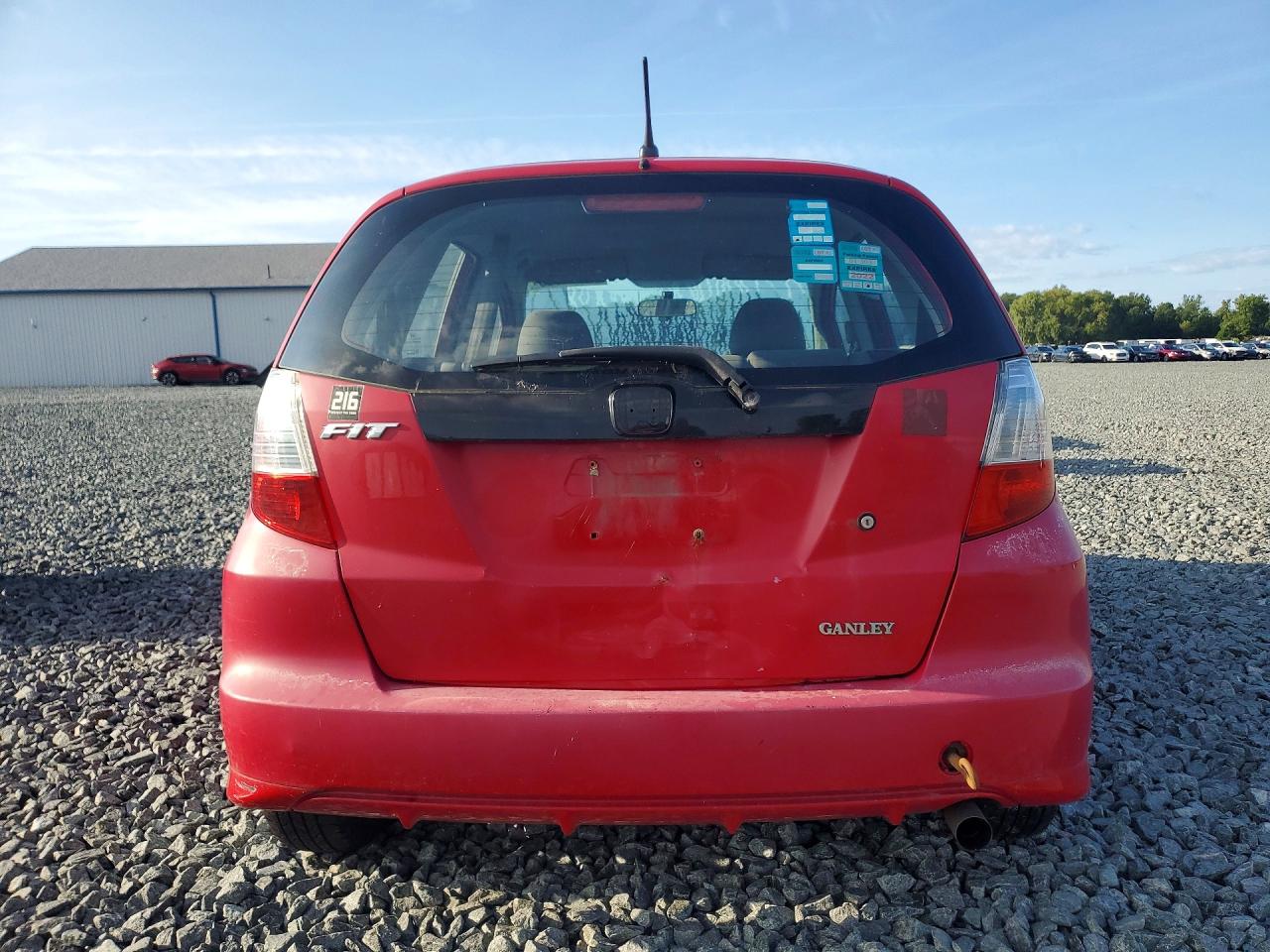 2010 Honda Fit Red vin: JHMGE8H26AC015475