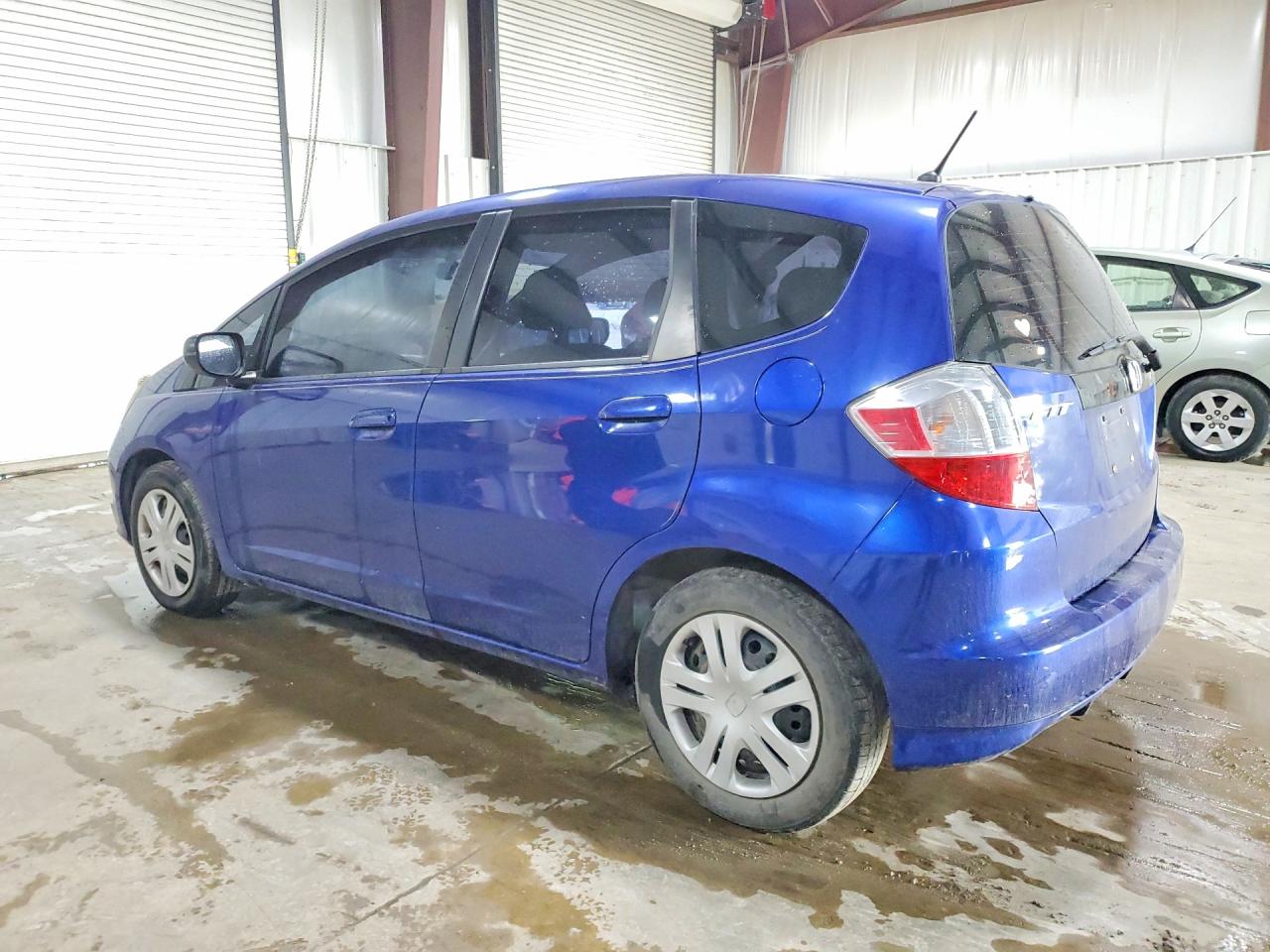 2010 Honda Fit Blue vin: JHMGE8H26AS003543