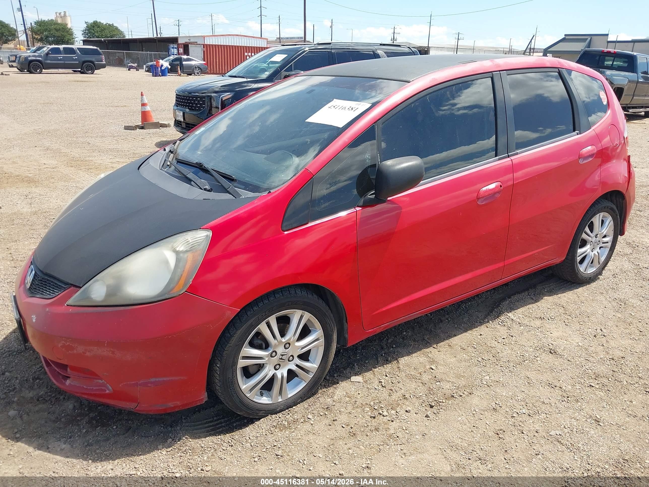 2010 Honda Fit   Red vin: JHMGE8H27AC010754