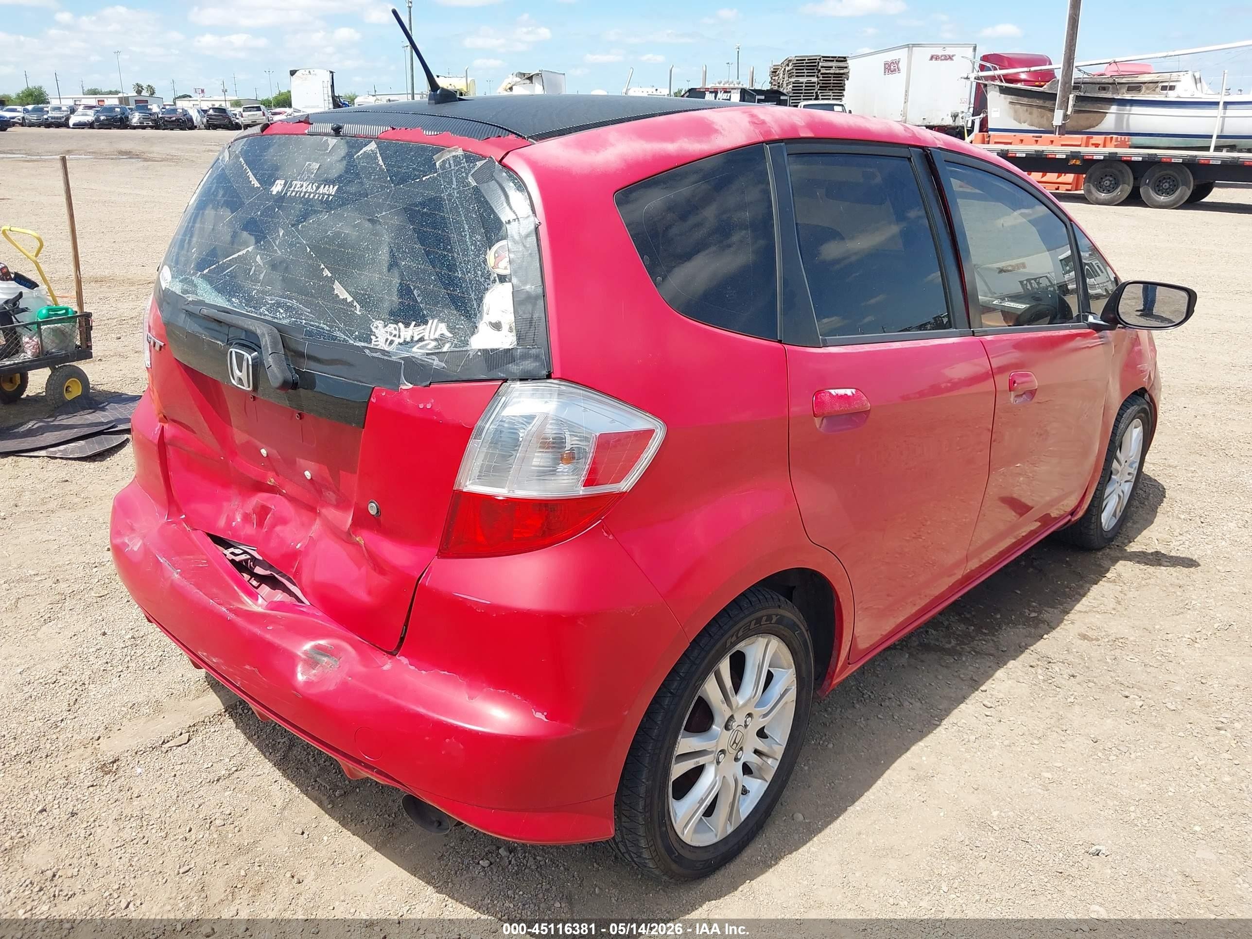 2010 Honda Fit   Red vin: JHMGE8H27AC010754