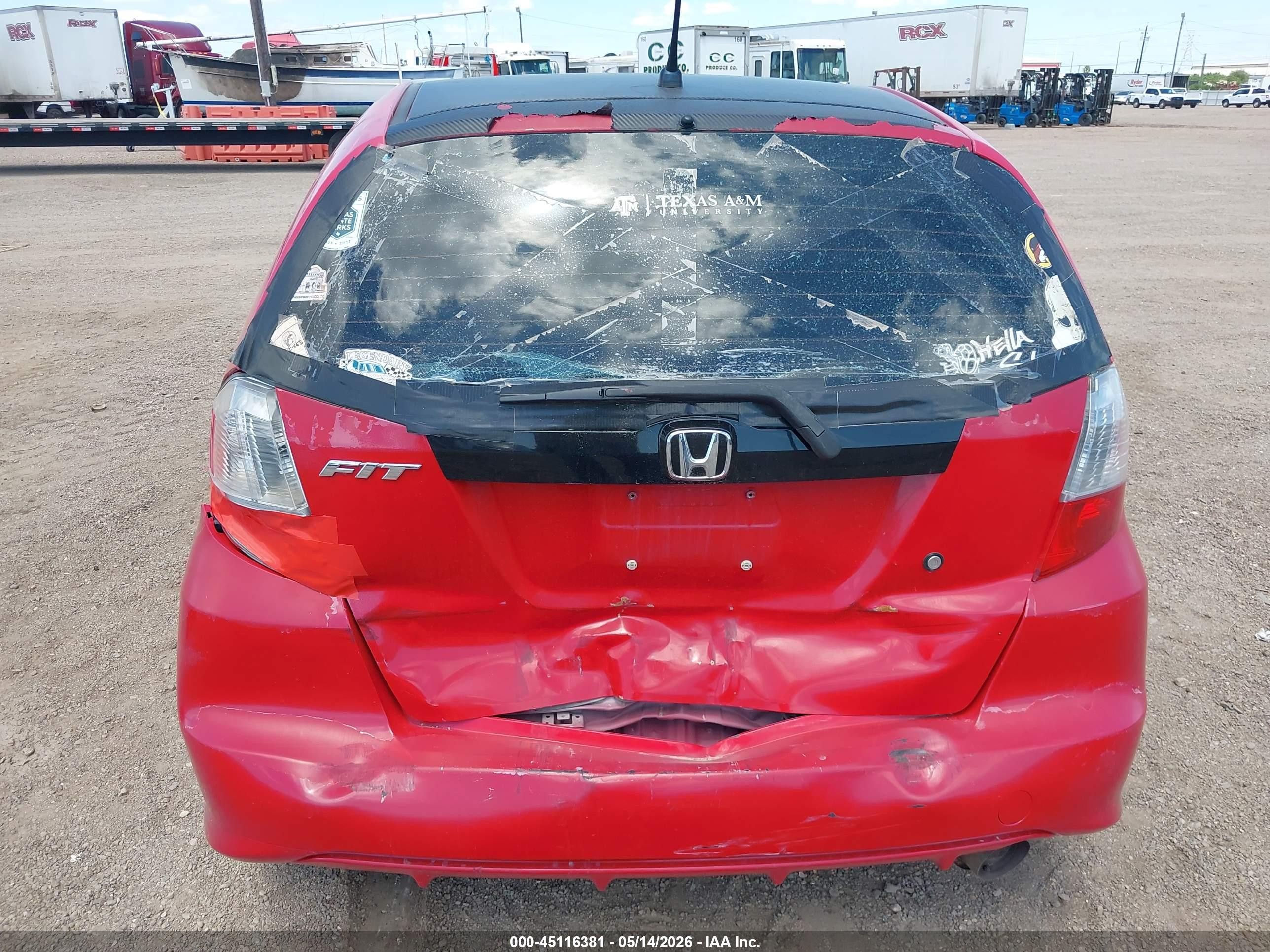 2010 Honda Fit   Red vin: JHMGE8H27AC010754