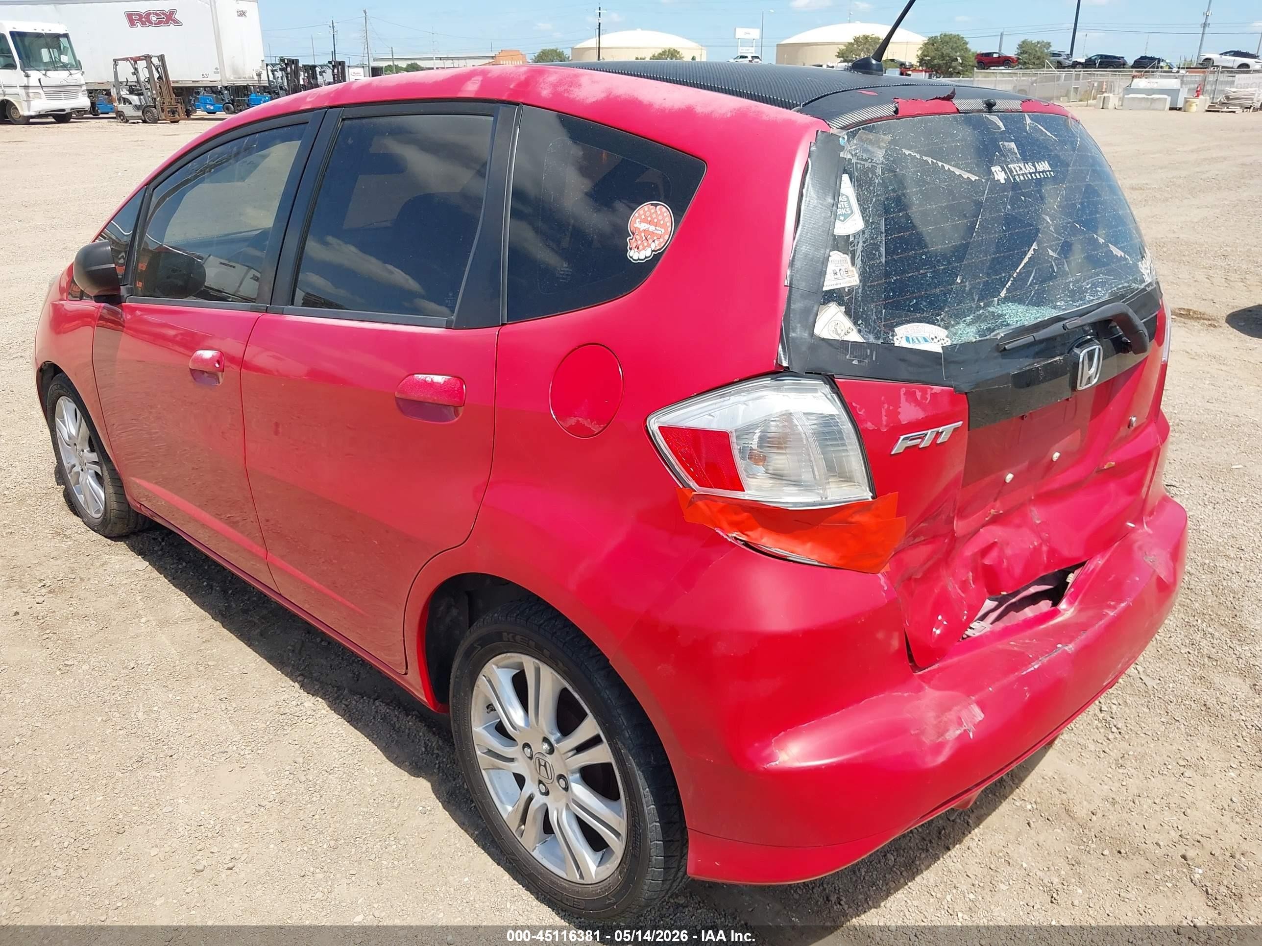 2010 Honda Fit   Red vin: JHMGE8H27AC010754