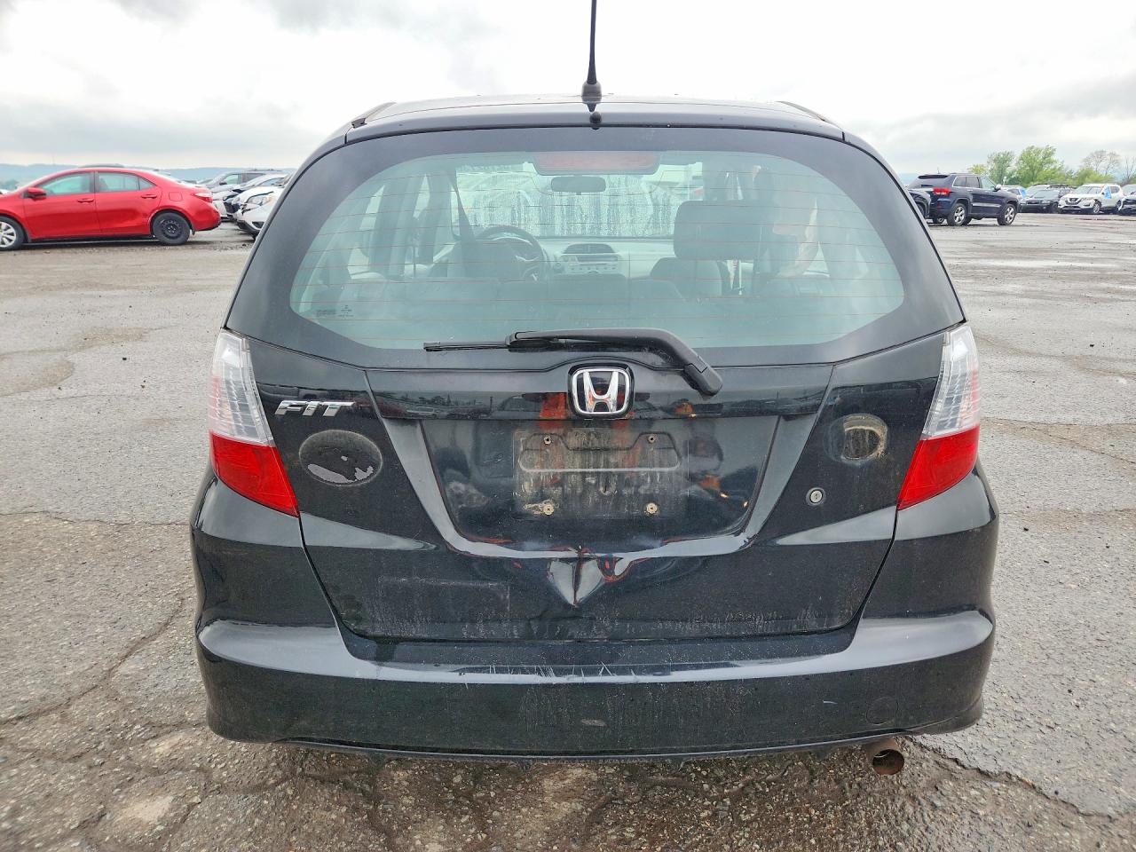 2010 Honda Fit Black vin: JHMGE8H27AC039395
