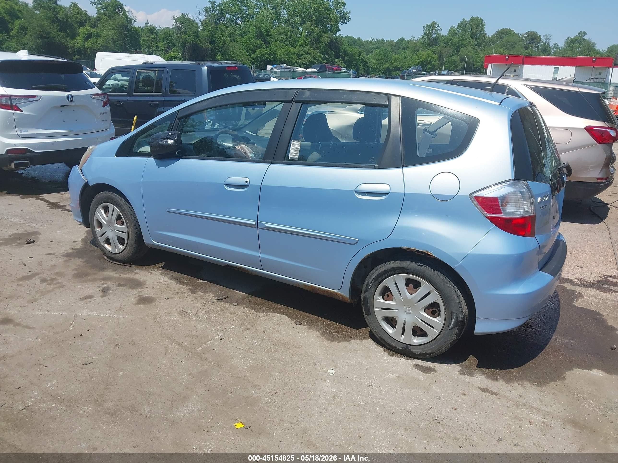 2010 Honda Fit Light Blue vin: JHMGE8H29AC026650