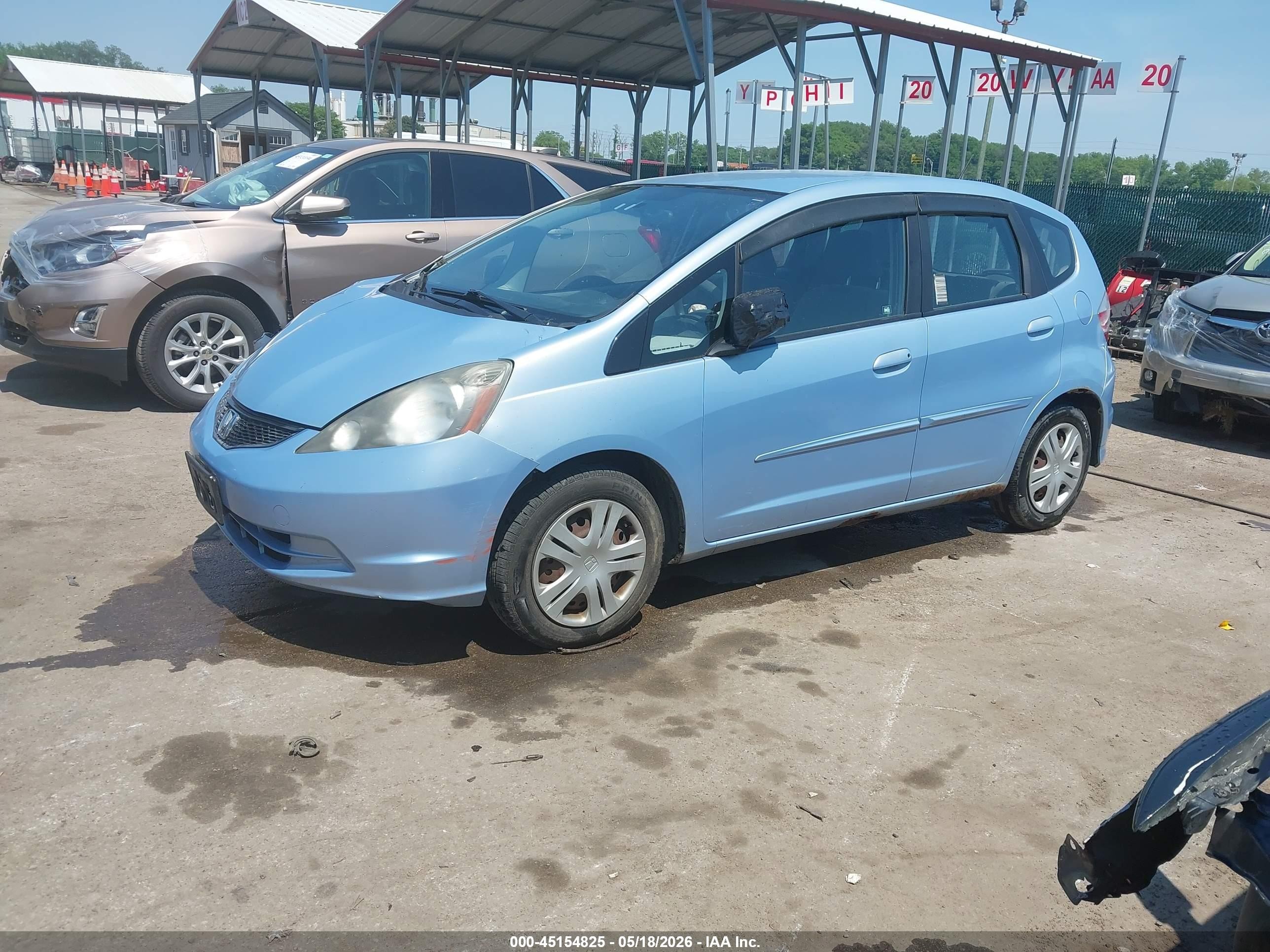 2010 Honda Fit Light Blue vin: JHMGE8H29AC026650