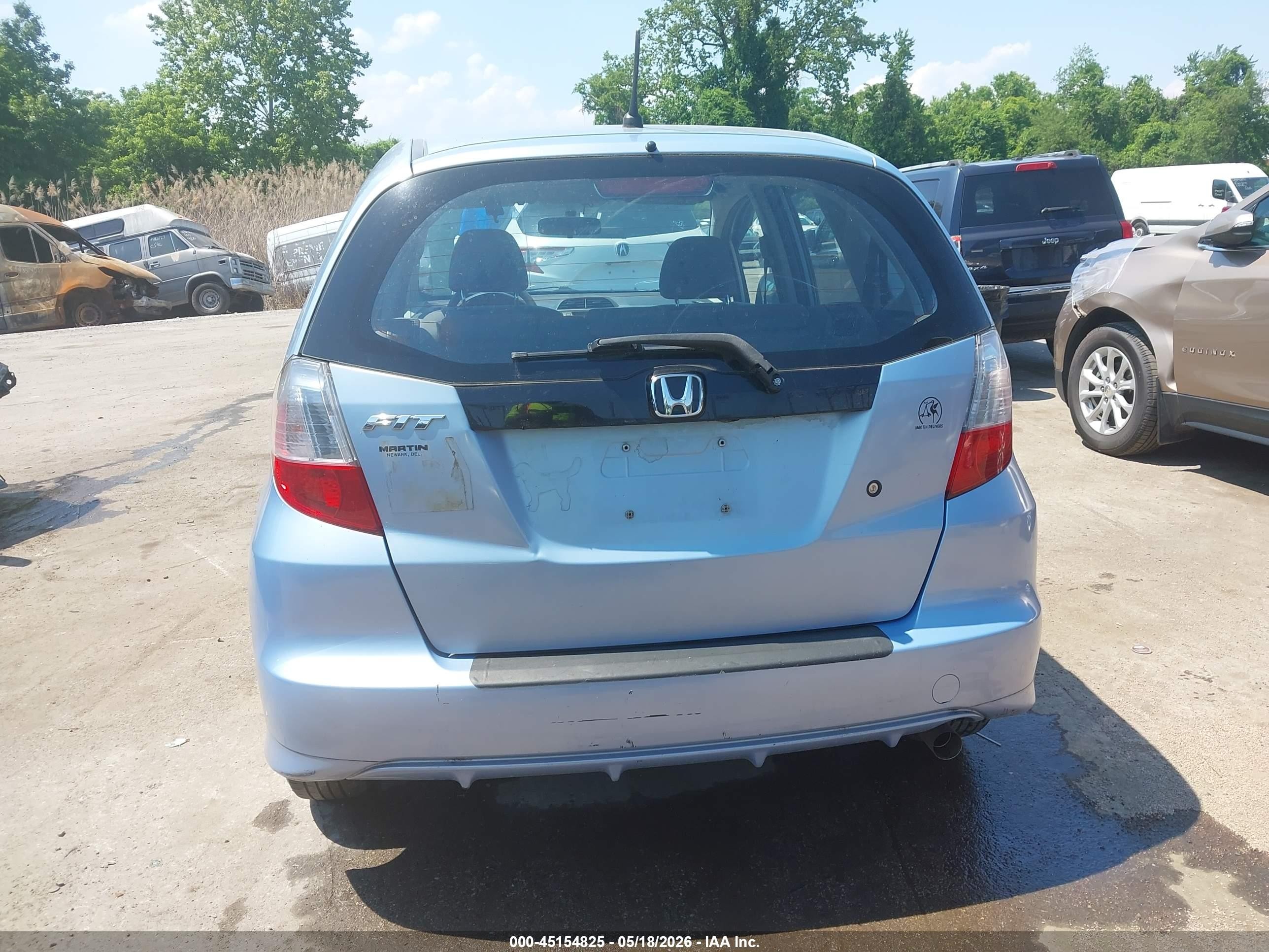 2010 Honda Fit Light Blue vin: JHMGE8H29AC026650