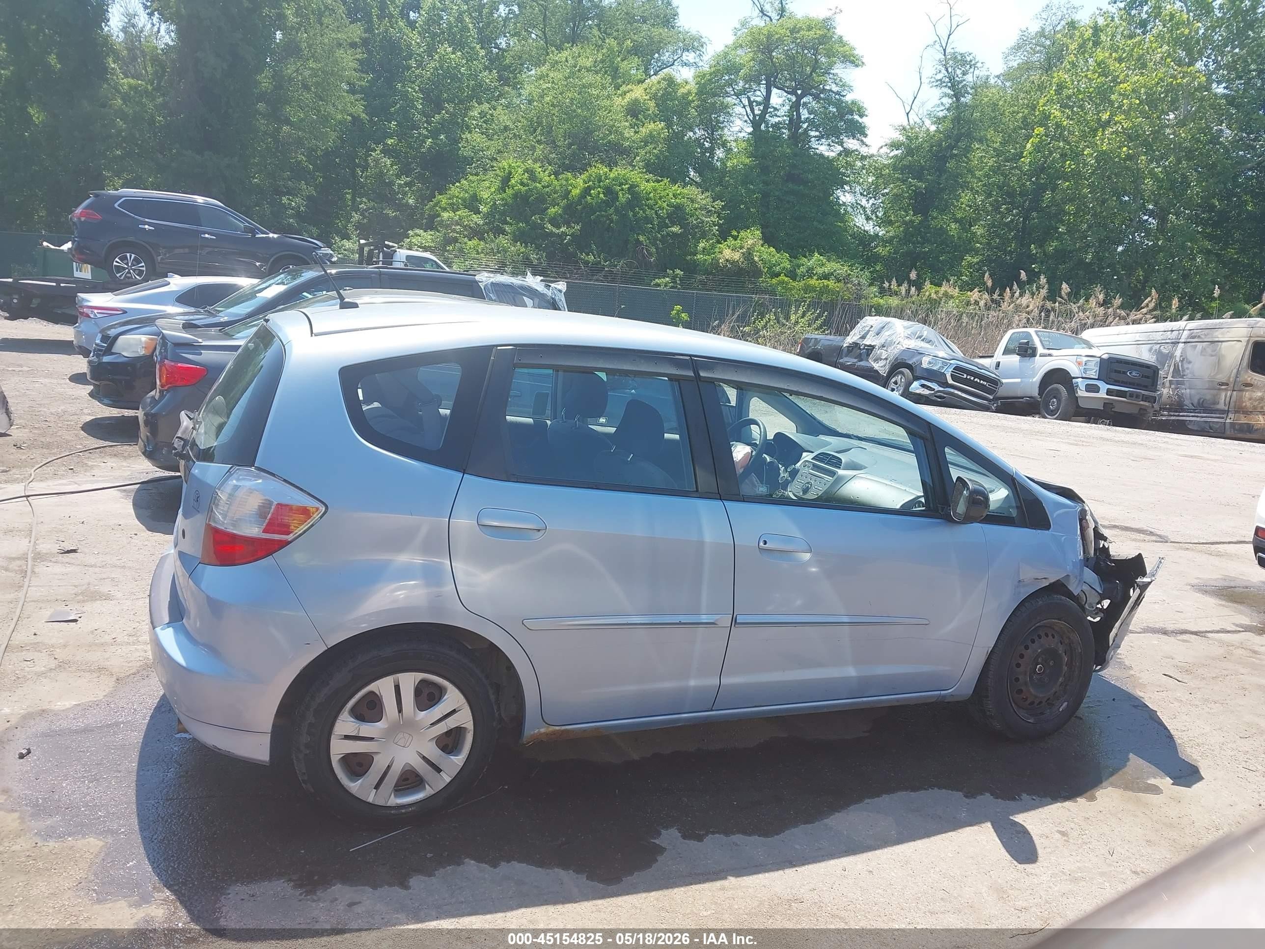 2010 Honda Fit Light Blue vin: JHMGE8H29AC026650