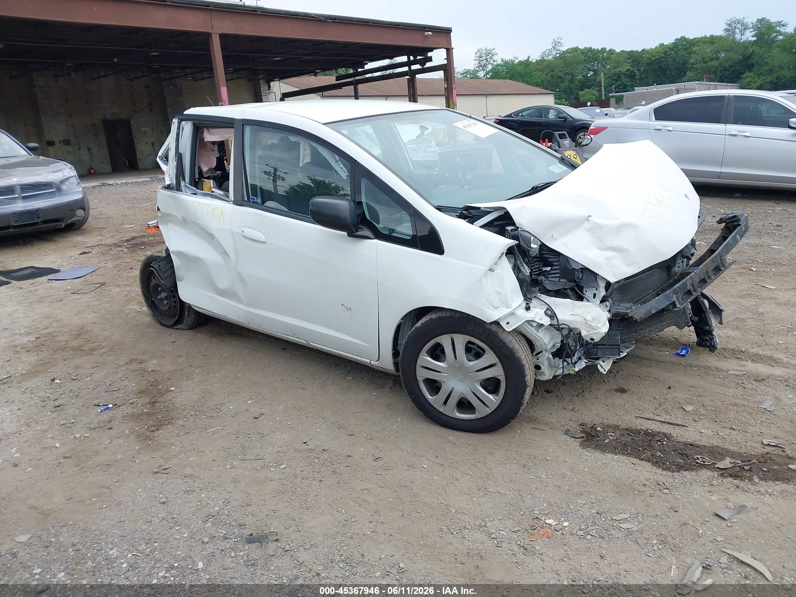 2010 Honda Fit   White vin: JHMGE8H29AS003732