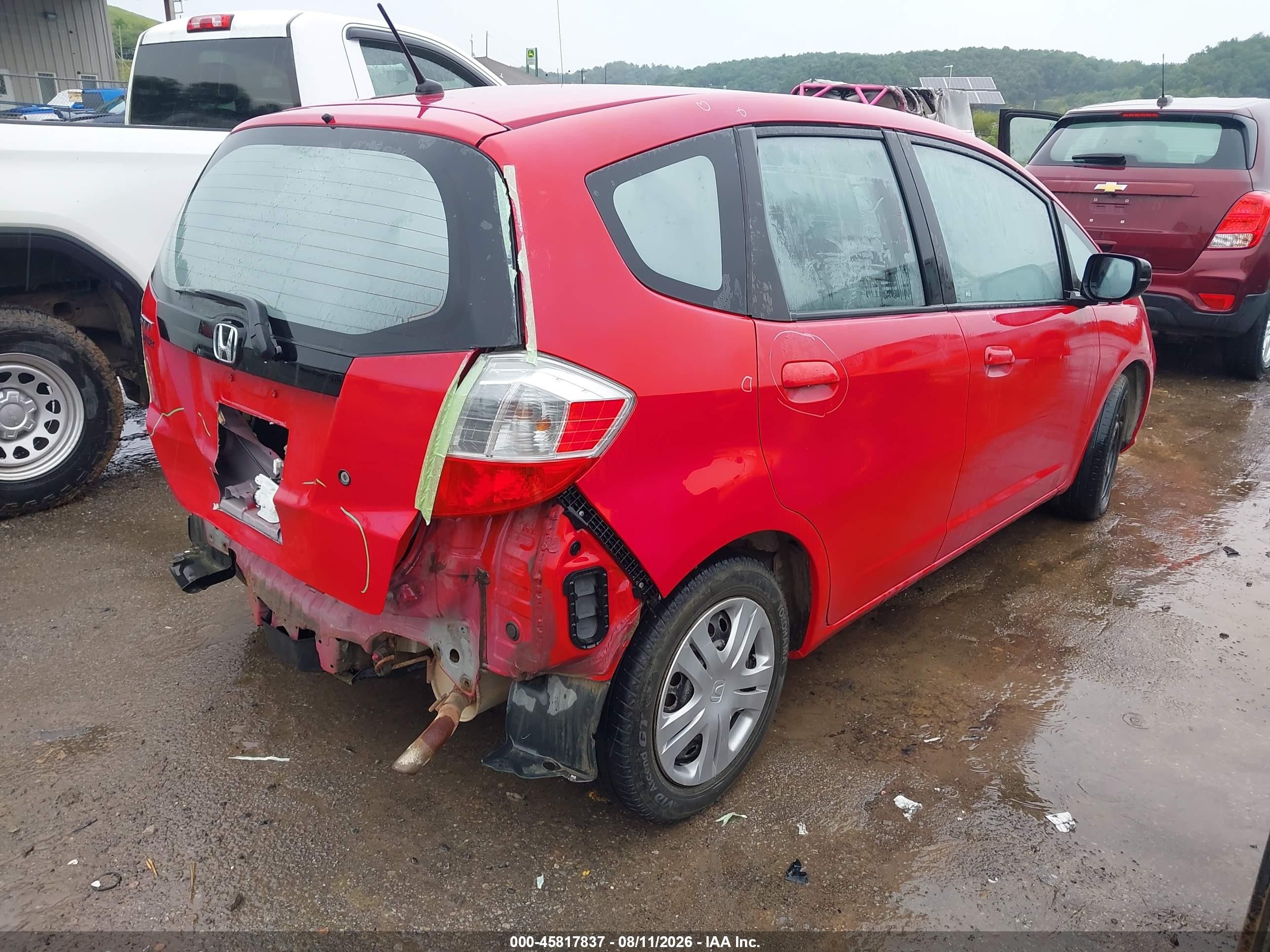 2010 Honda Fit Red vin: JHMGE8H2XAC004611
