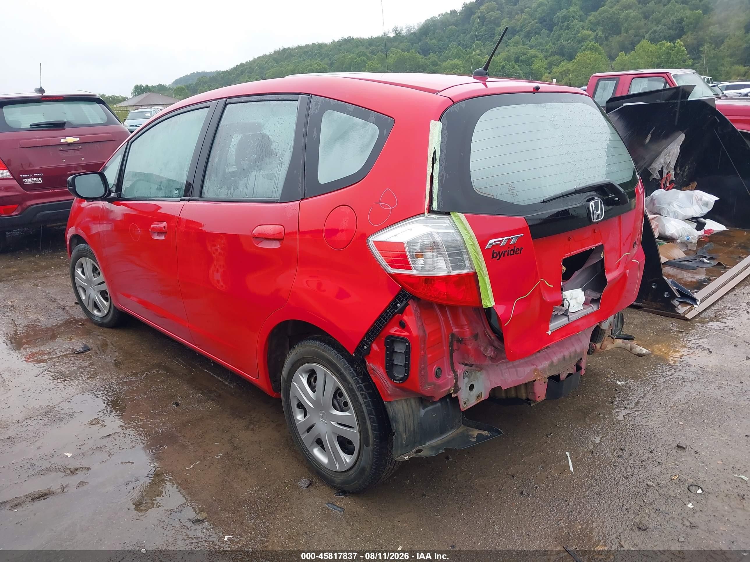 2010 Honda Fit Red vin: JHMGE8H2XAC004611