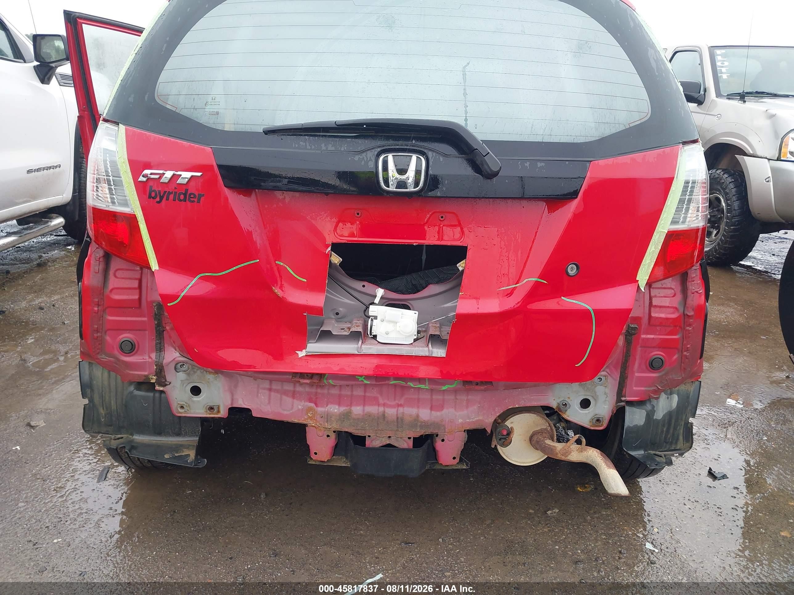 2010 Honda Fit Red vin: JHMGE8H2XAC004611