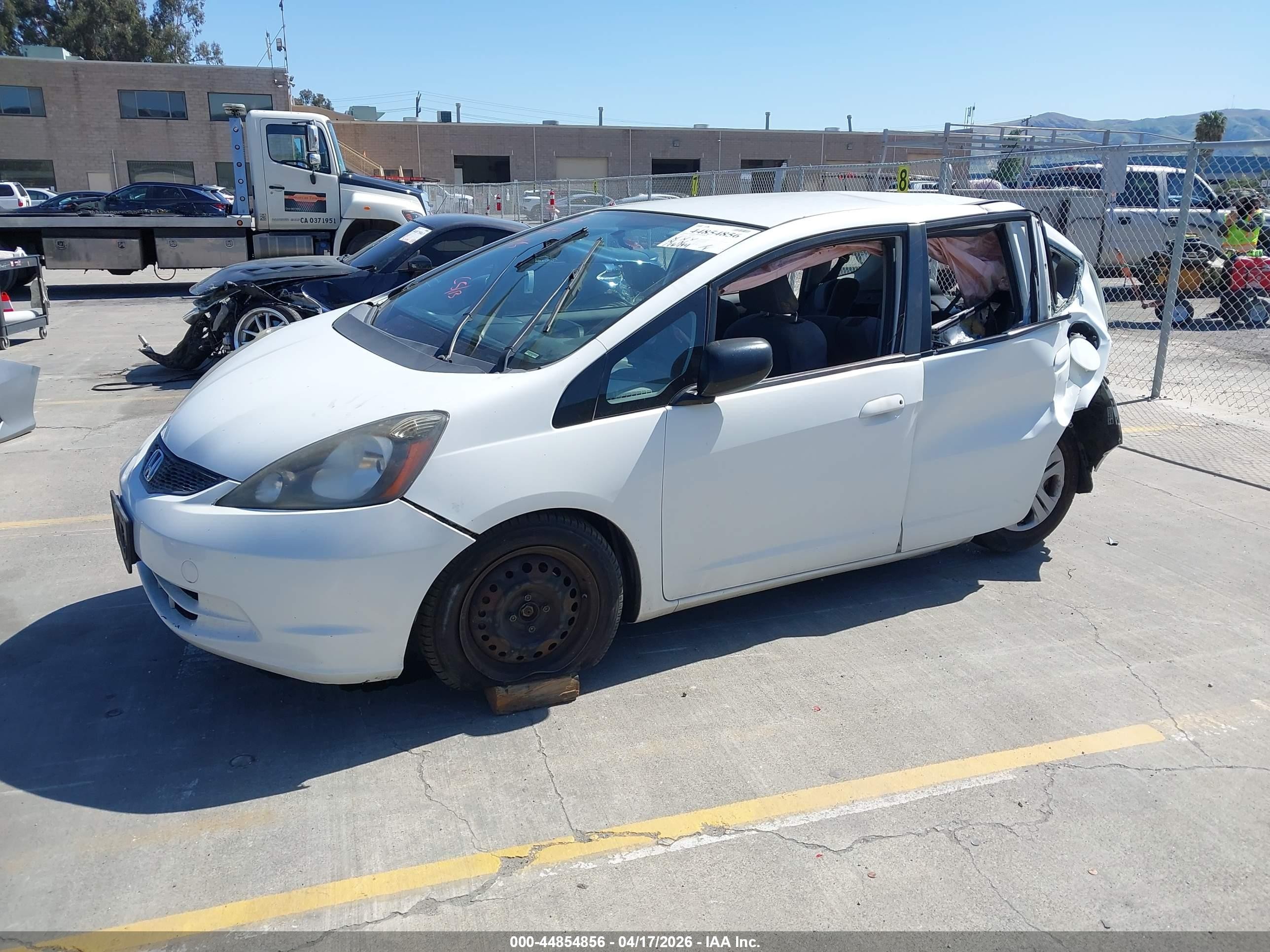 2010 Honda Fit   White vin: JHMGE8H2XAS019034