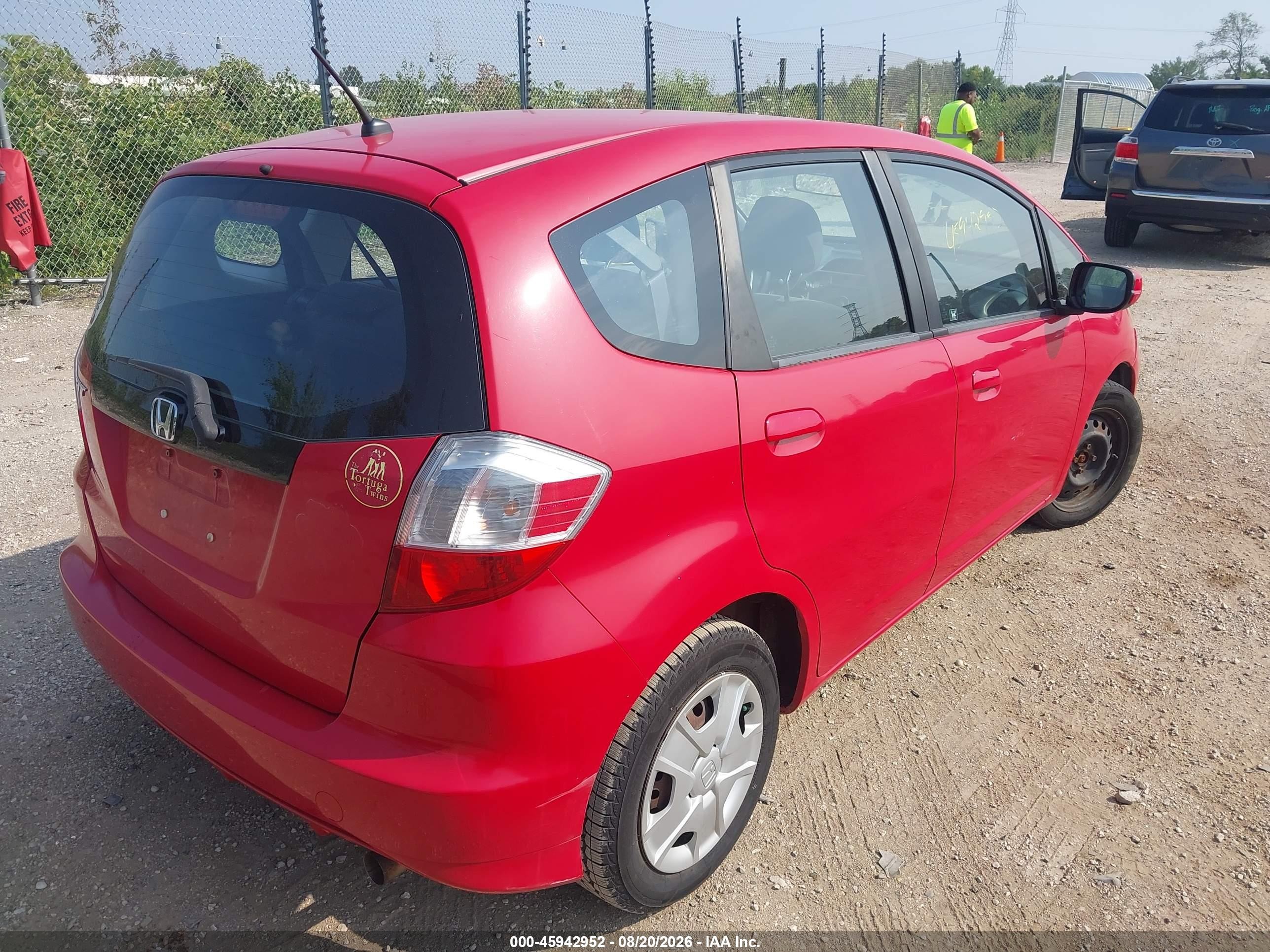 2012 Honda Fit   Red vin: JHMGE8H30CC037404
