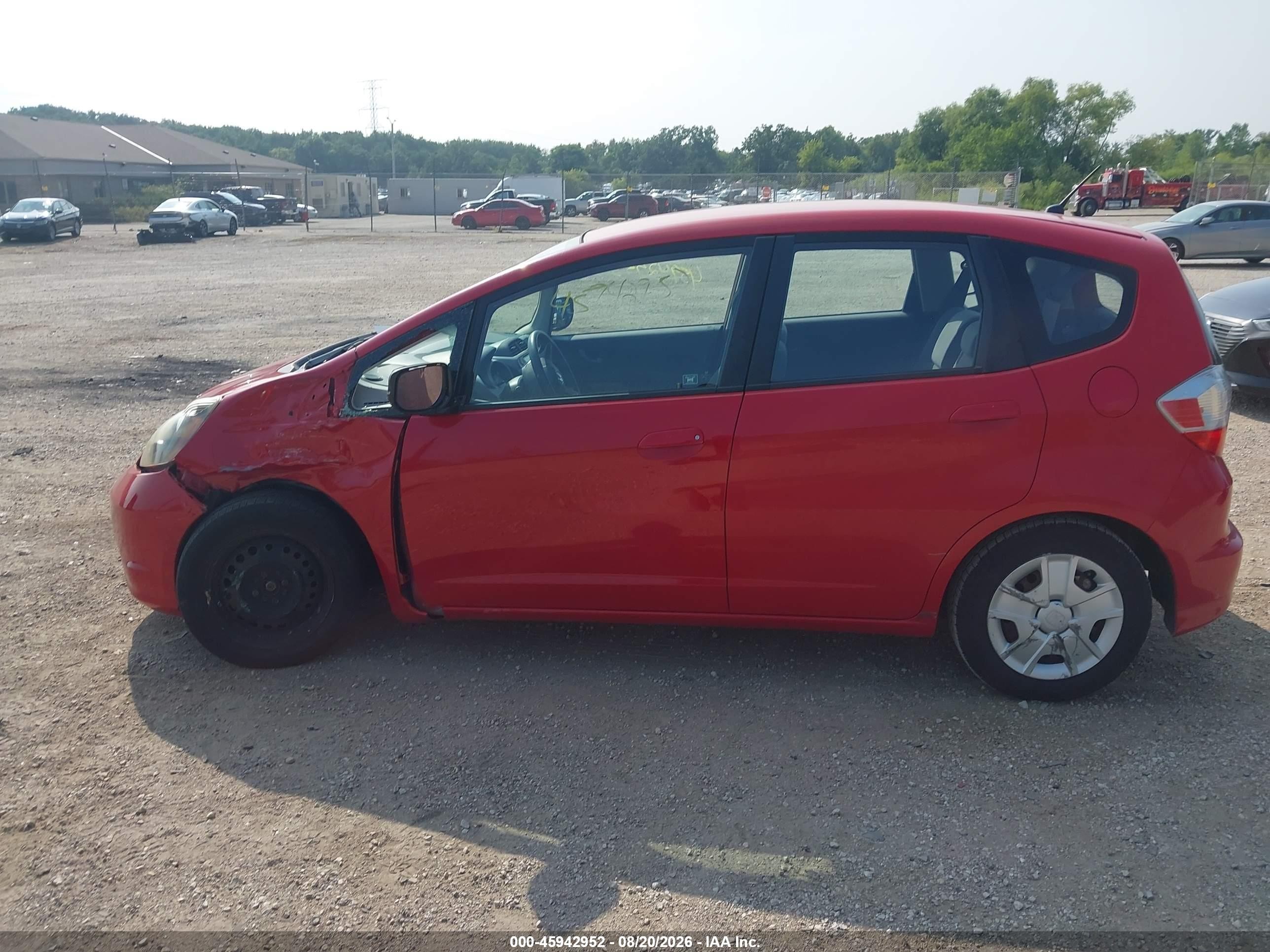 2012 Honda Fit   Red vin: JHMGE8H30CC037404