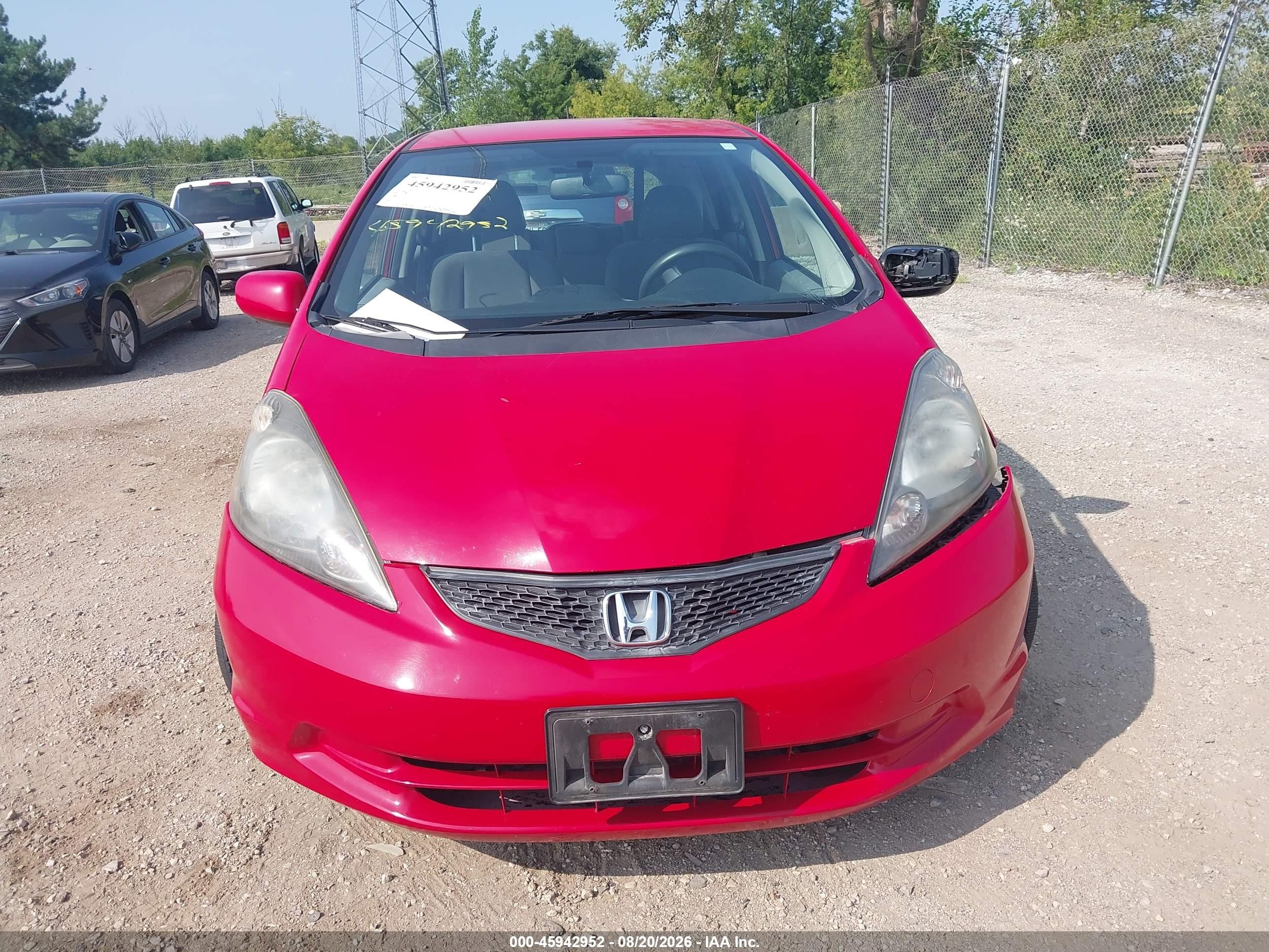 2012 Honda Fit   Red vin: JHMGE8H30CC037404