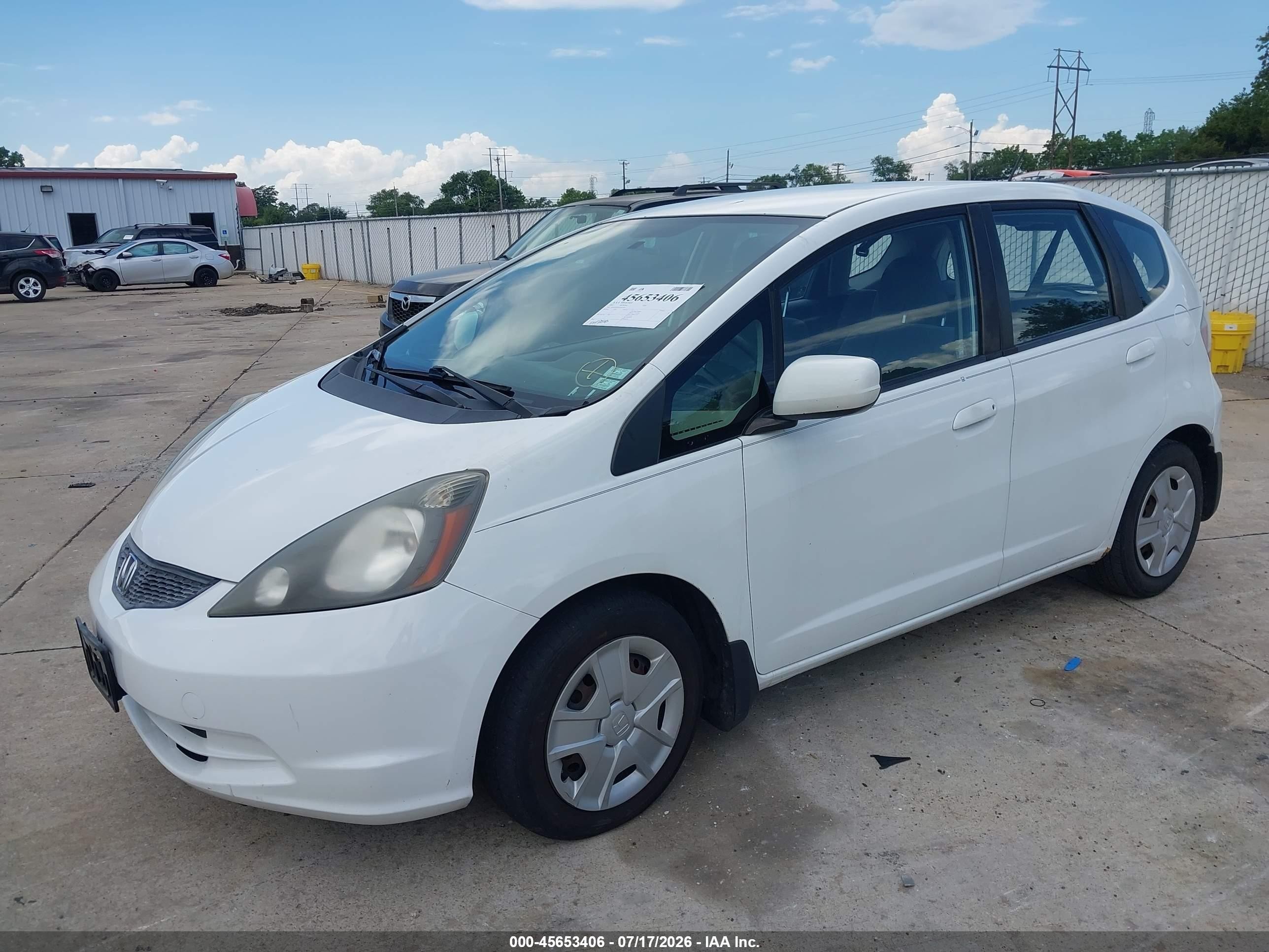 2012 Honda Fit   White vin: JHMGE8H30CS005963
