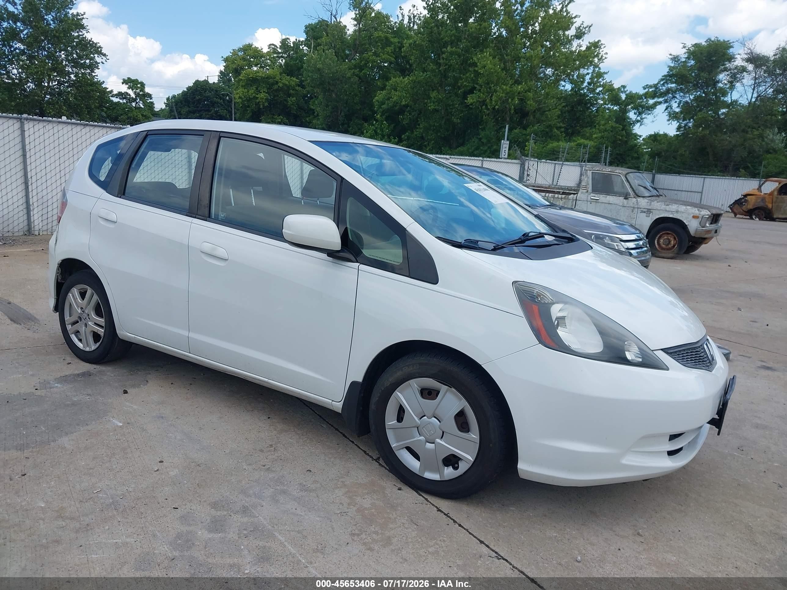 2012 Honda Fit   White vin: JHMGE8H30CS005963
