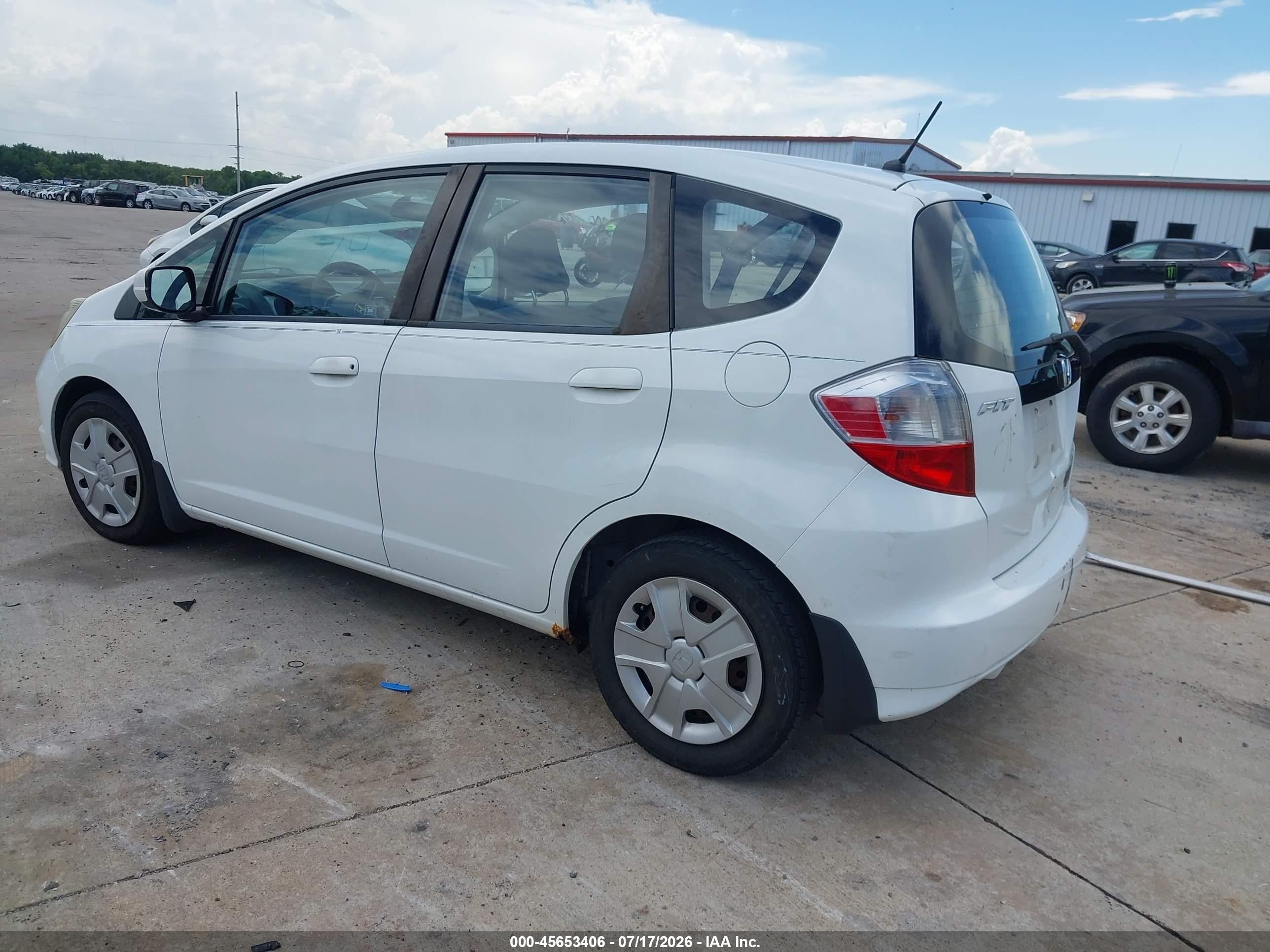 2012 Honda Fit   White vin: JHMGE8H30CS005963
