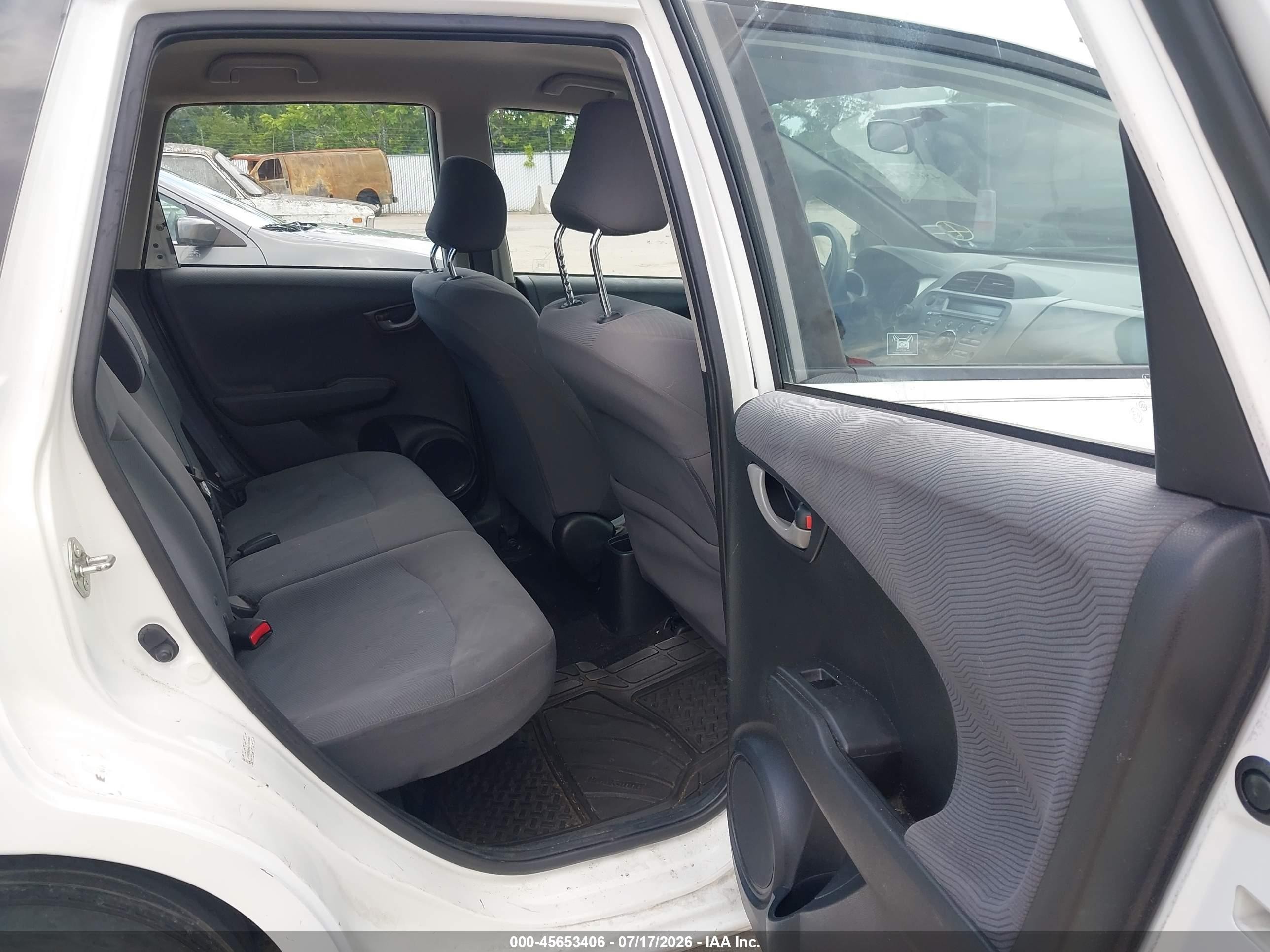 2012 Honda Fit   White vin: JHMGE8H30CS005963