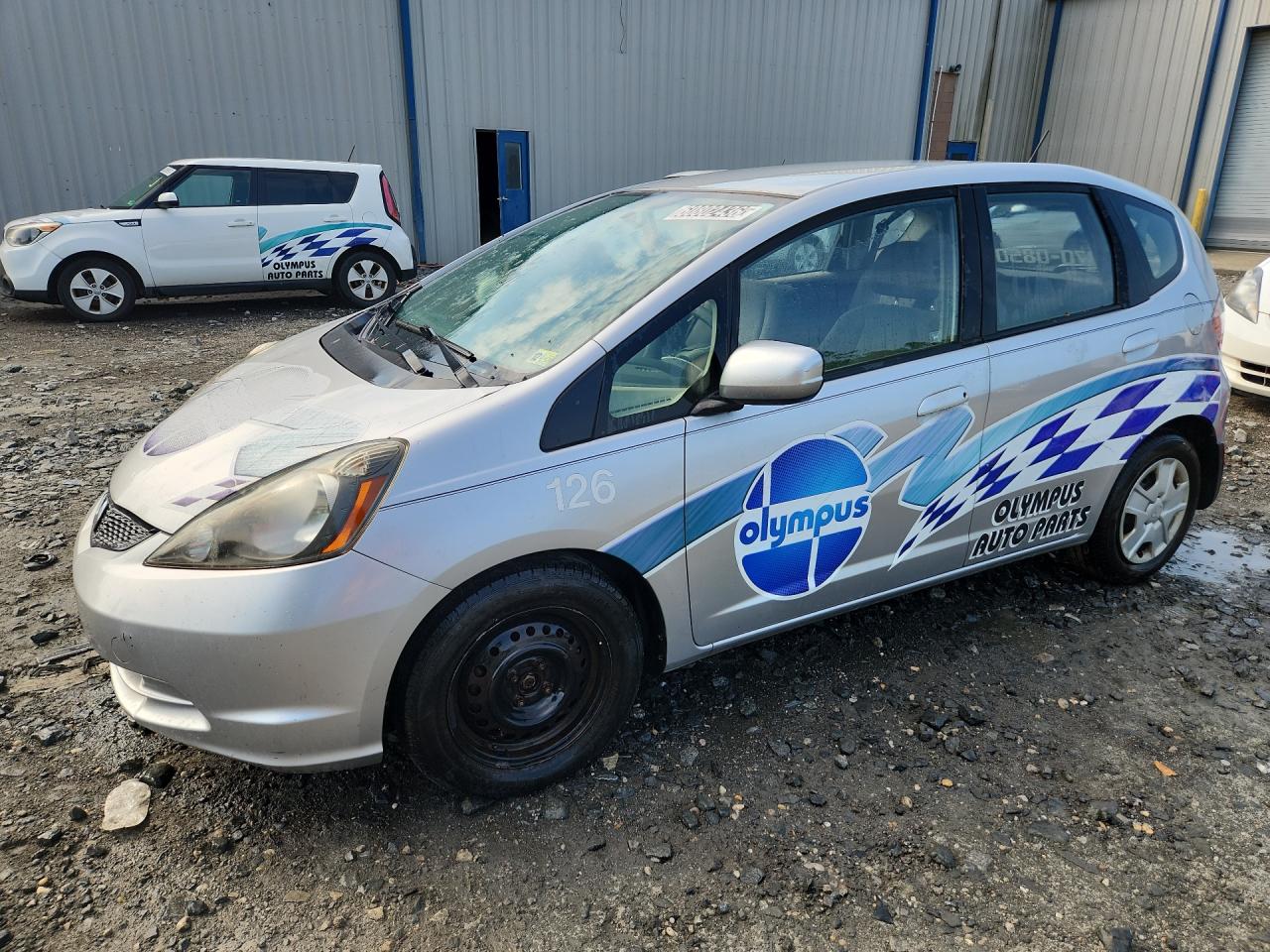 2013 Honda Fit Серебряный vin: JHMGE8H30DC049019 Damage: Left Front Wheel Cover, Missing, Replacement Required