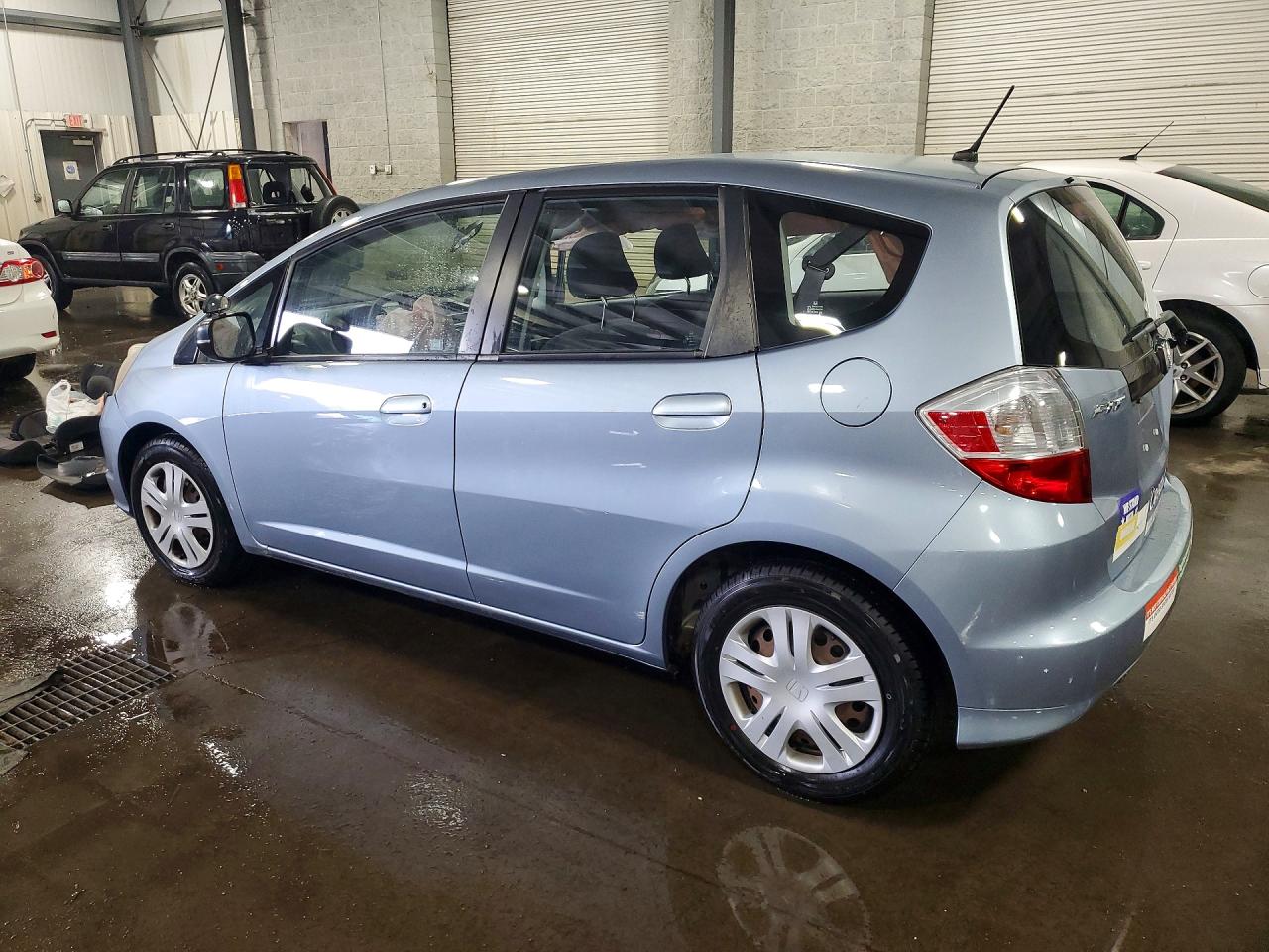 2011 Honda Fit Blue vin: JHMGE8H31BC025180