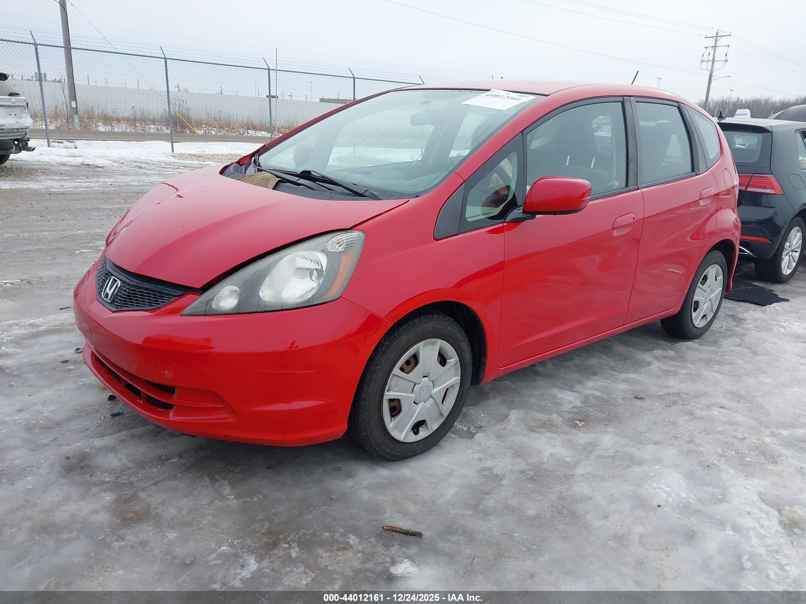2013 Honda Fit   Red vin: JHMGE8H32DC001702