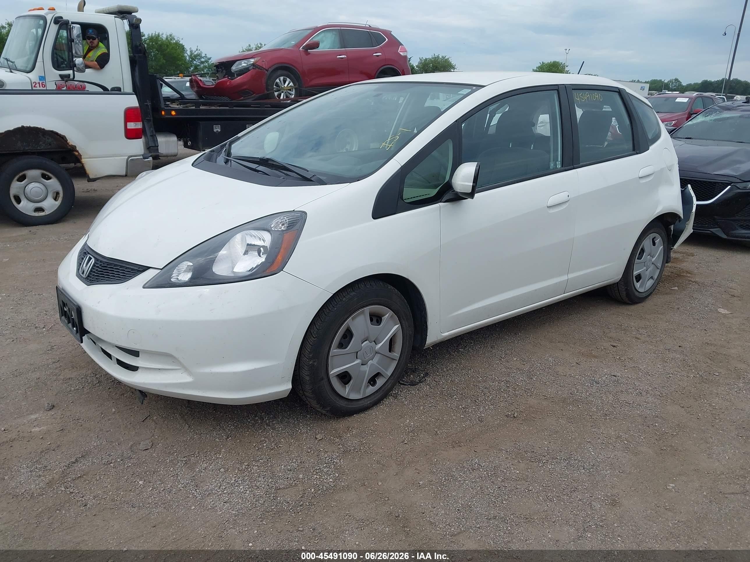2013 Honda Fit   White vin: JHMGE8H32DC049703